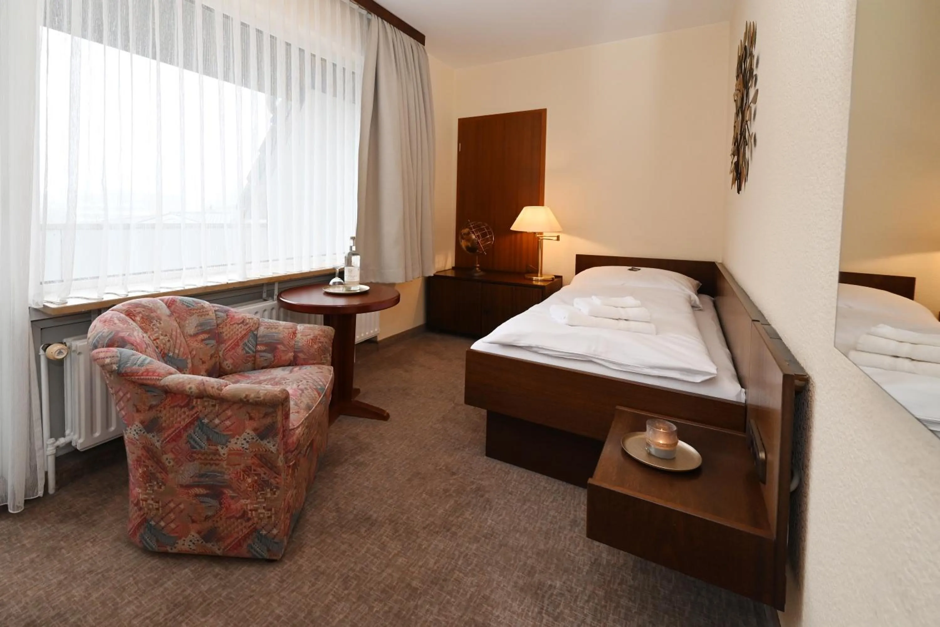 Photo of the whole room, Bed in Strandhotel Salty