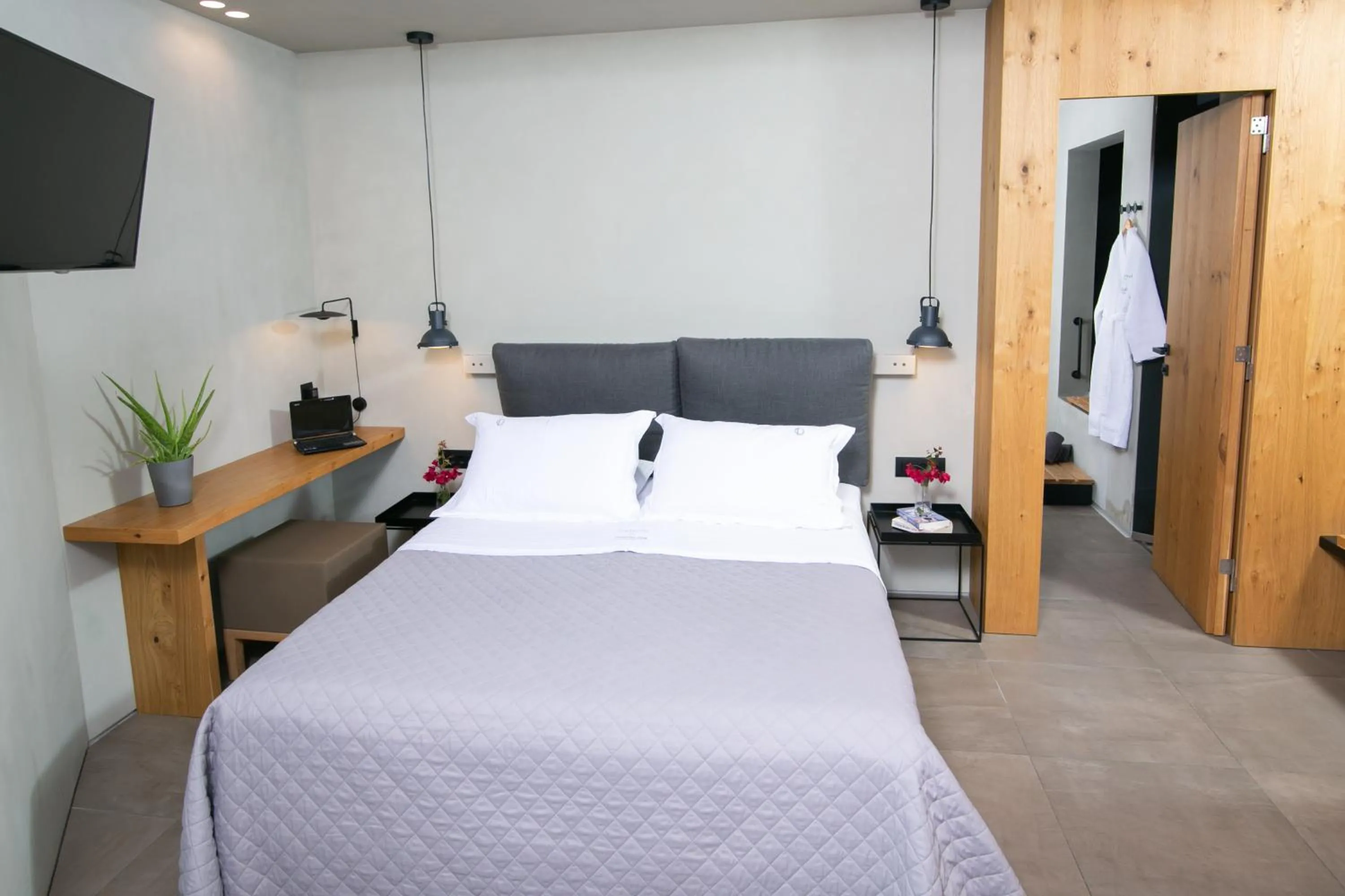 Bathroom, Bed in Marquise Suites - Adults Only