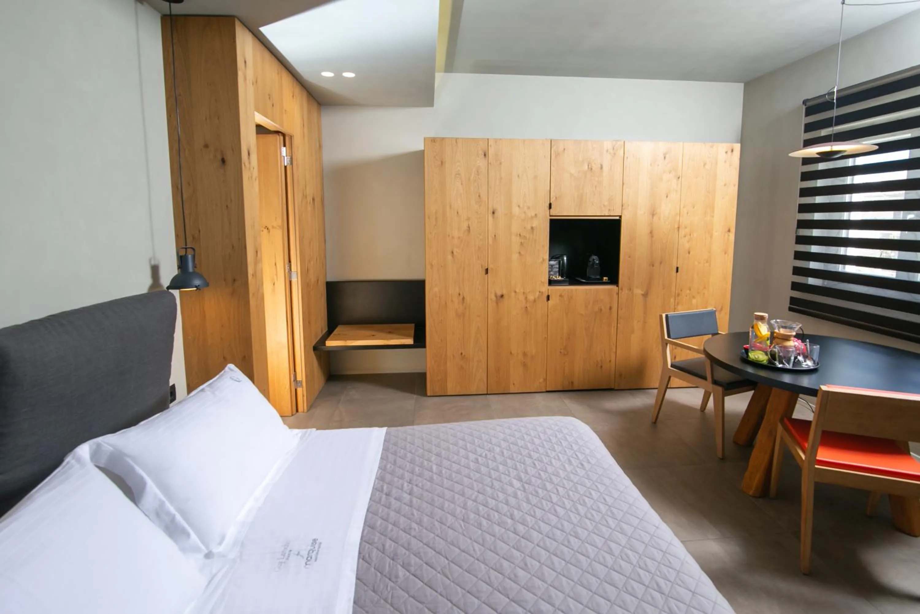 Coffee/tea facilities, Bed in Marquise Suites - Adults Only