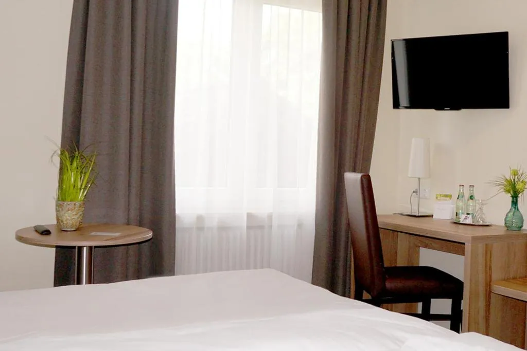 Photo of the whole room, Bed in Hotel Restaurant Huxmühle