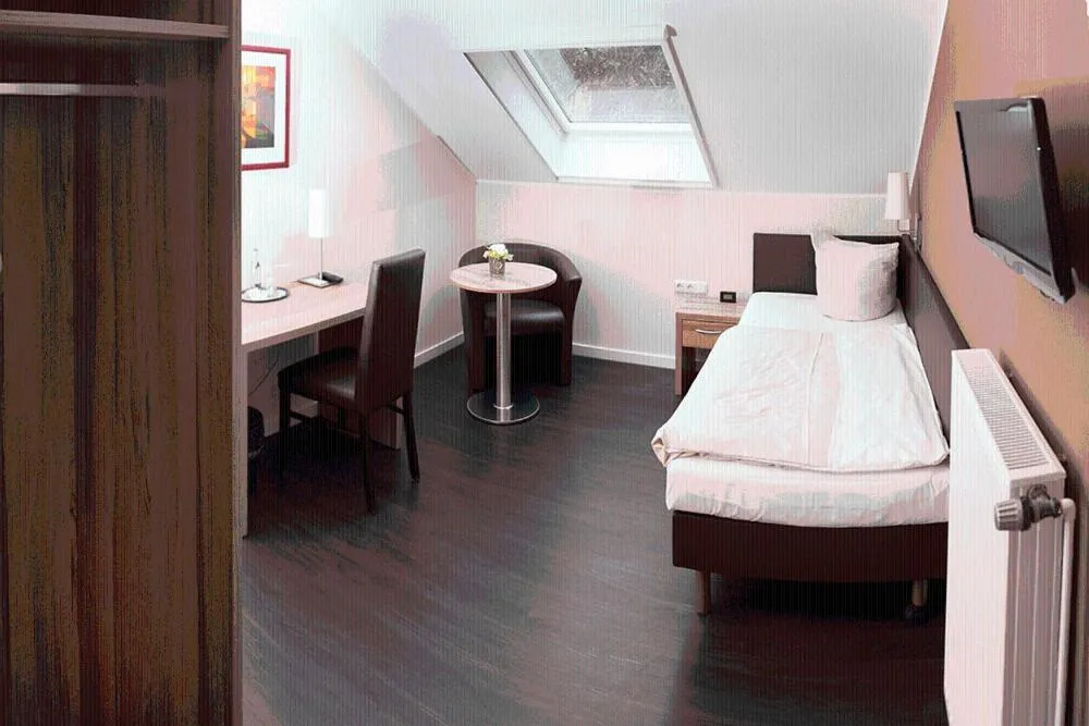 Photo of the whole room, Bed in Hotel Restaurant Huxmühle