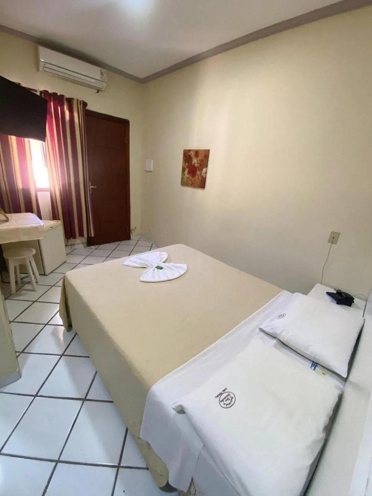 Bed in Pousada Dom Fernandes