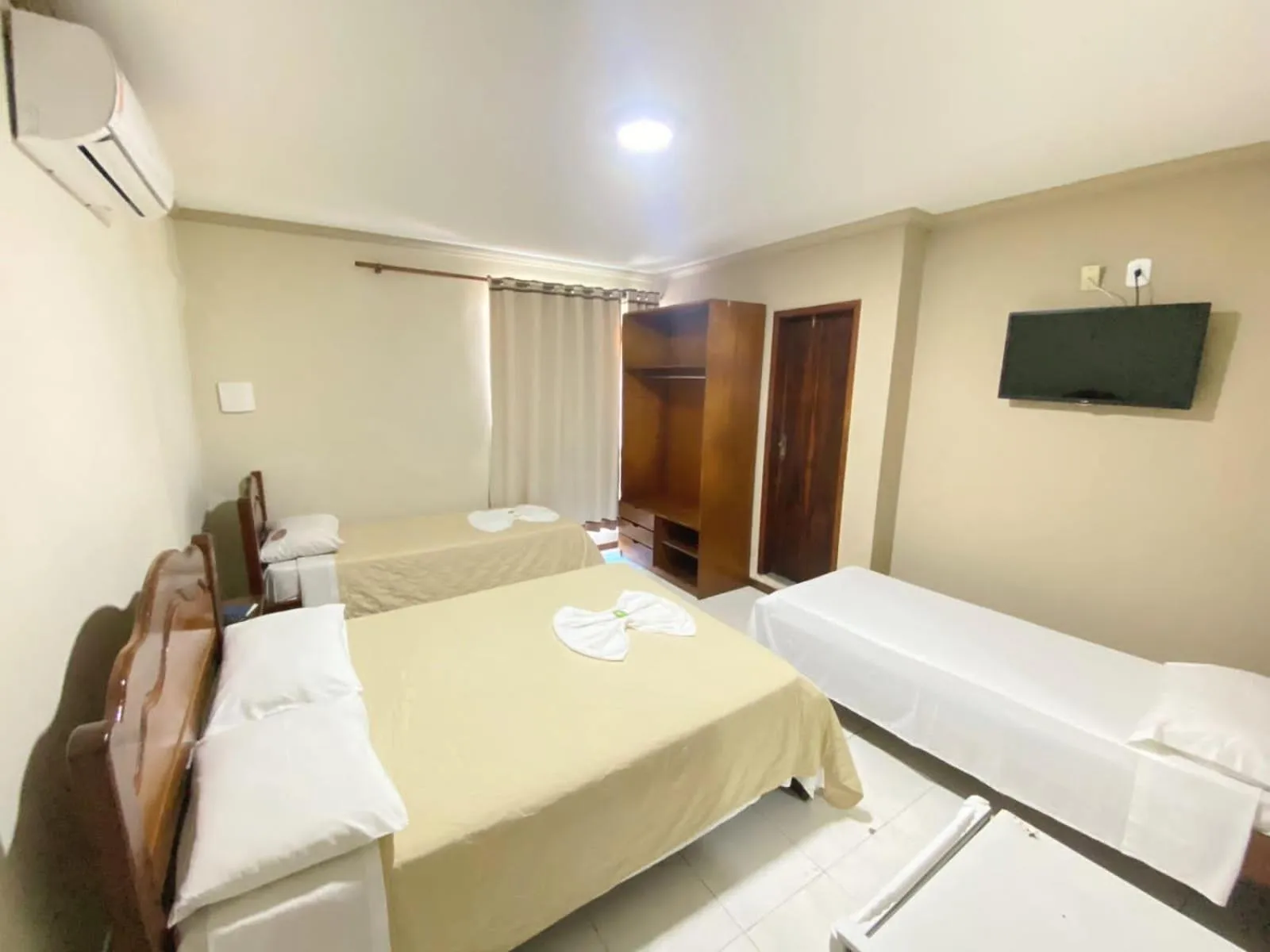 Bed in Pousada Dom Fernandes