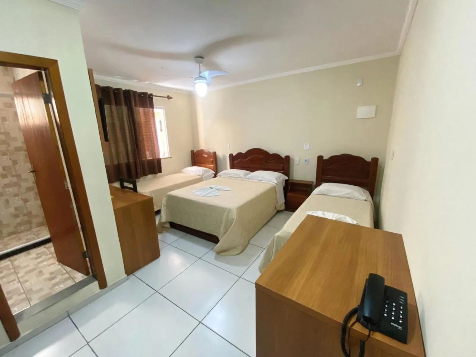 Bed in Pousada Dom Fernandes