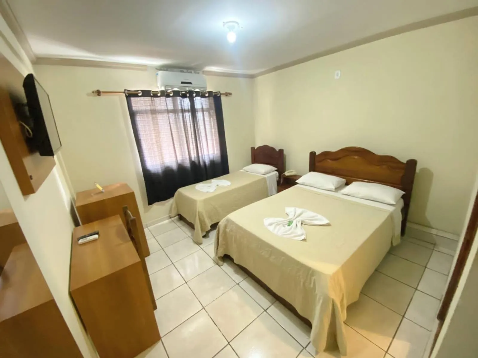 Bed in Pousada Dom Fernandes