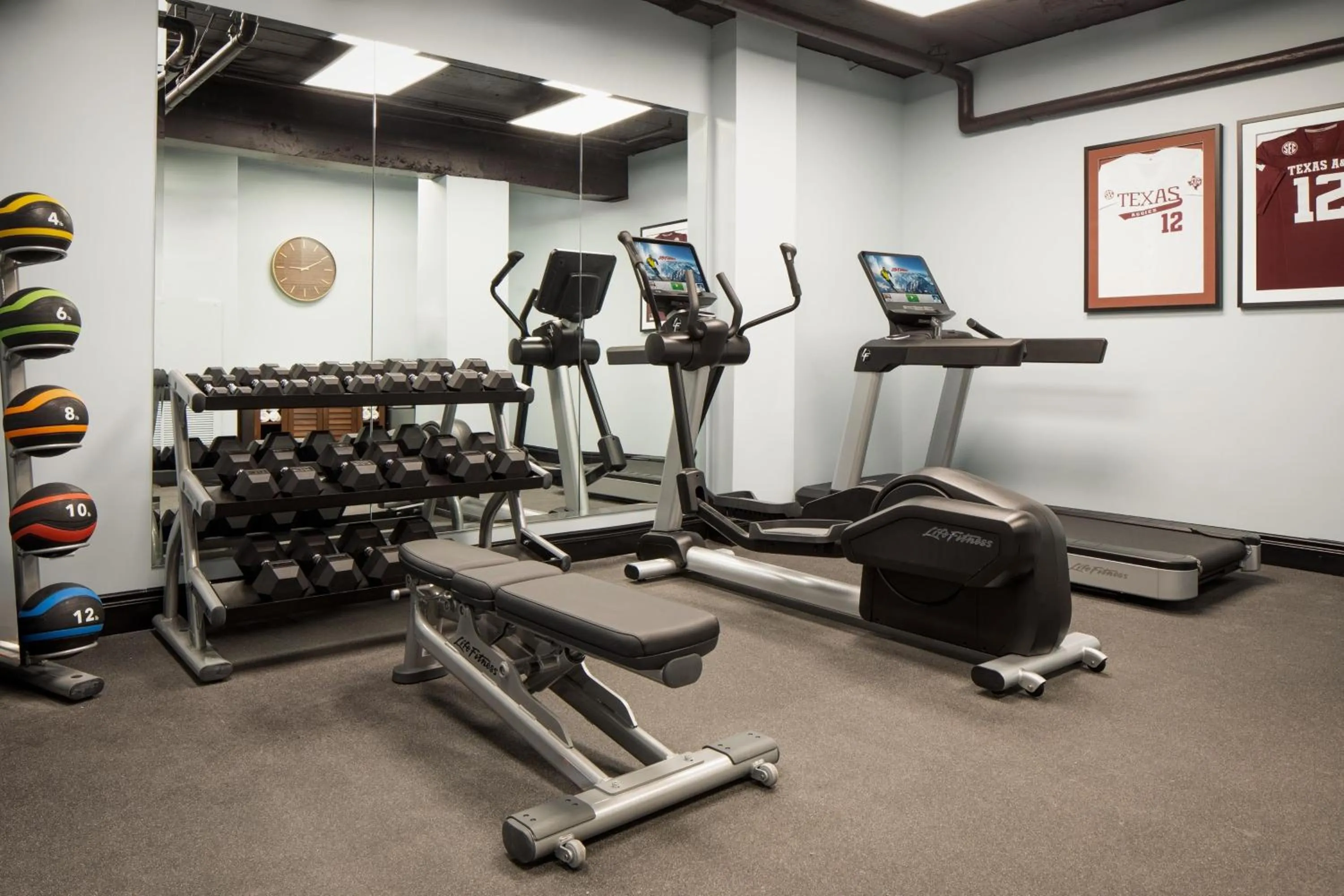 Fitness centre/facilities in The LaSalle Hotel, Bryan College Station, a Tribute Portfolio Hotel