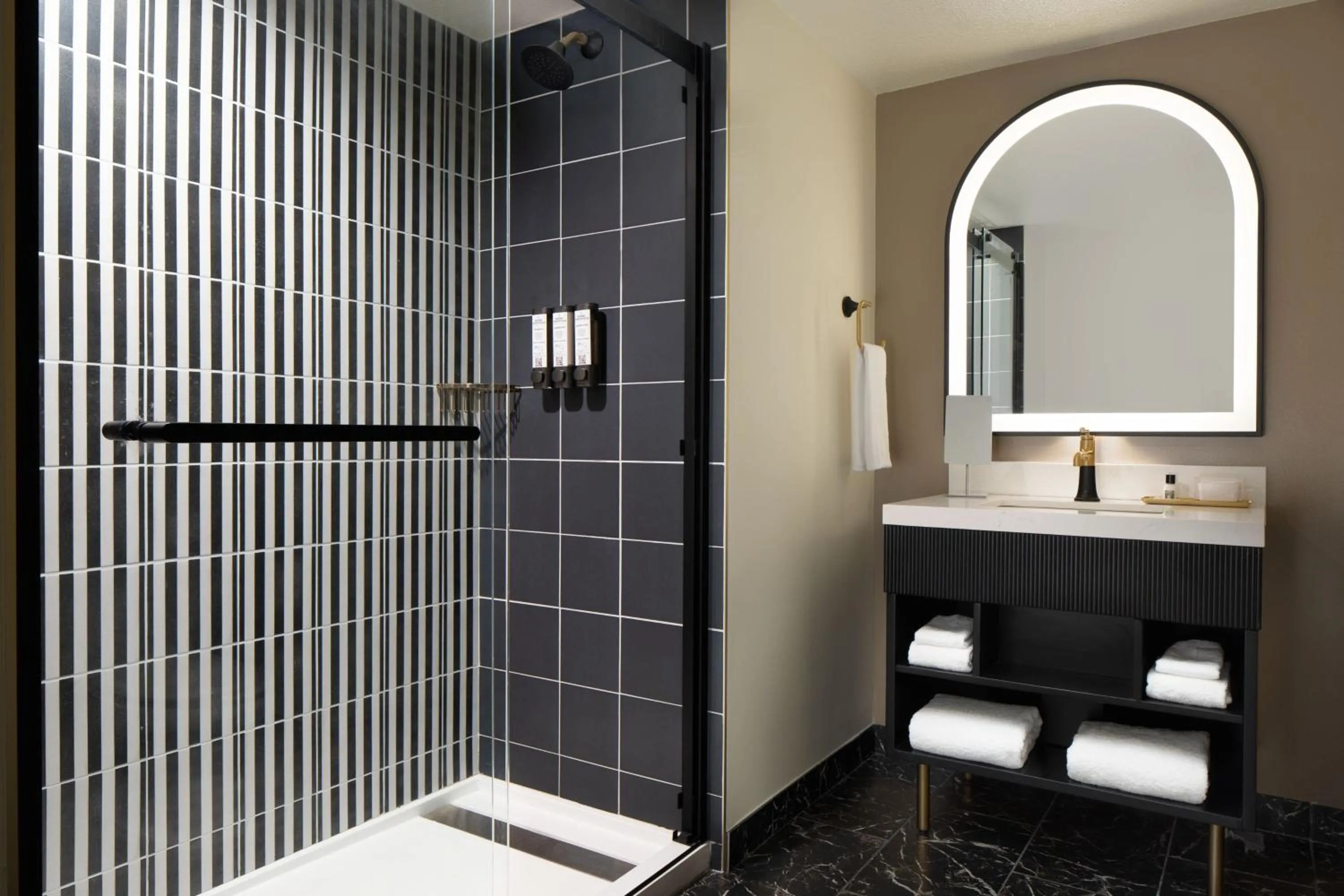 Bathroom in The LaSalle Hotel, Bryan College Station, a Tribute Portfolio Hotel