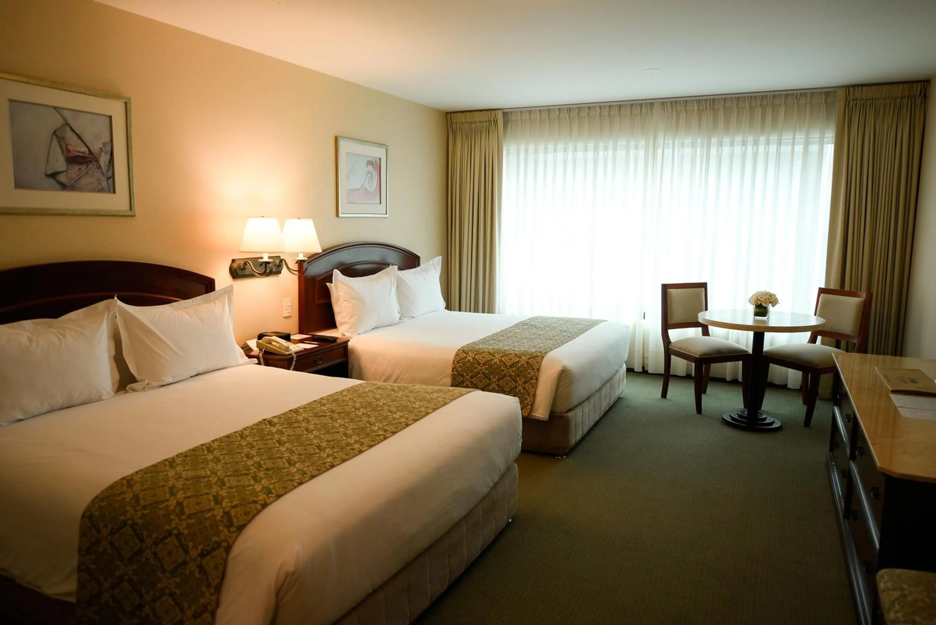 Bed in Los Tallanes Hotel & Suites