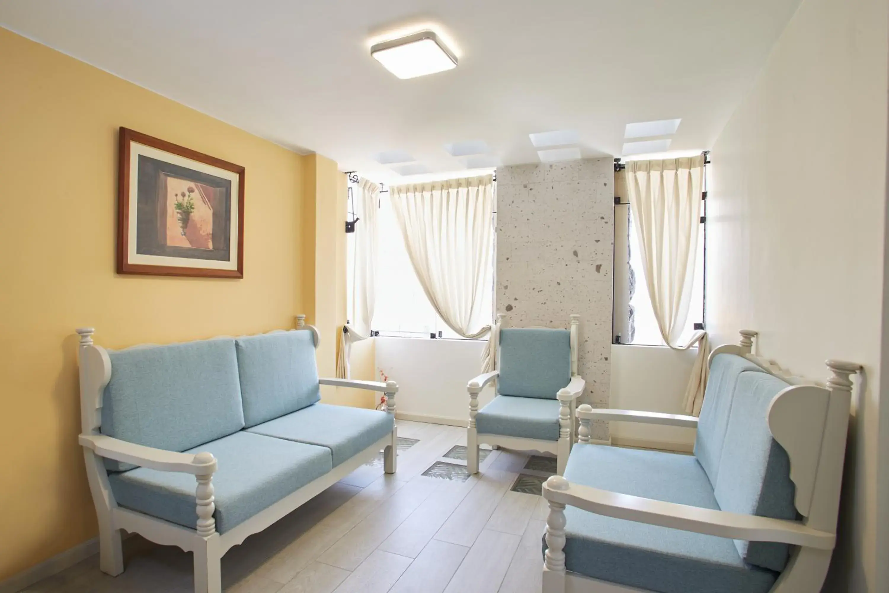 Living room in Natura Inn Hotel Living room in Natura Inn Hotel