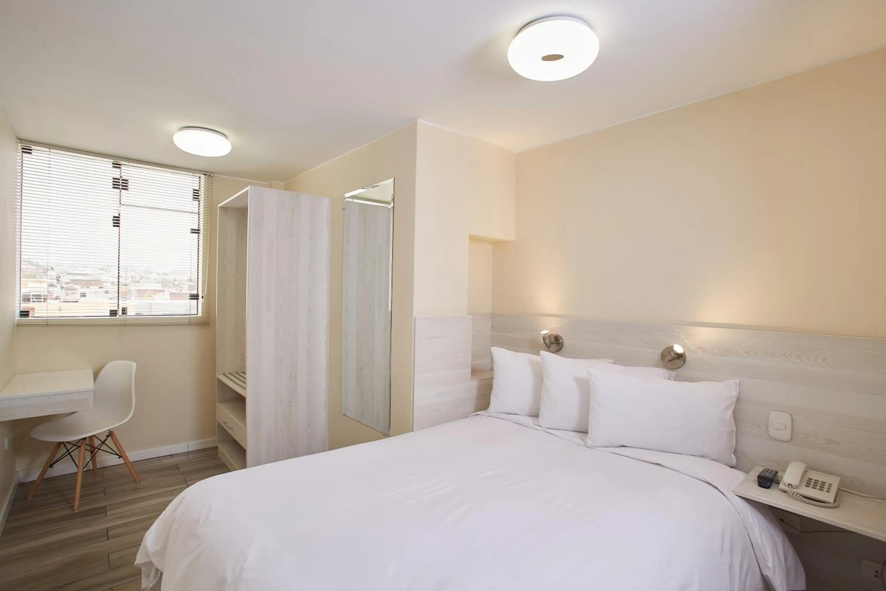 Photo of the whole room, Bed in Natura Inn Hotel