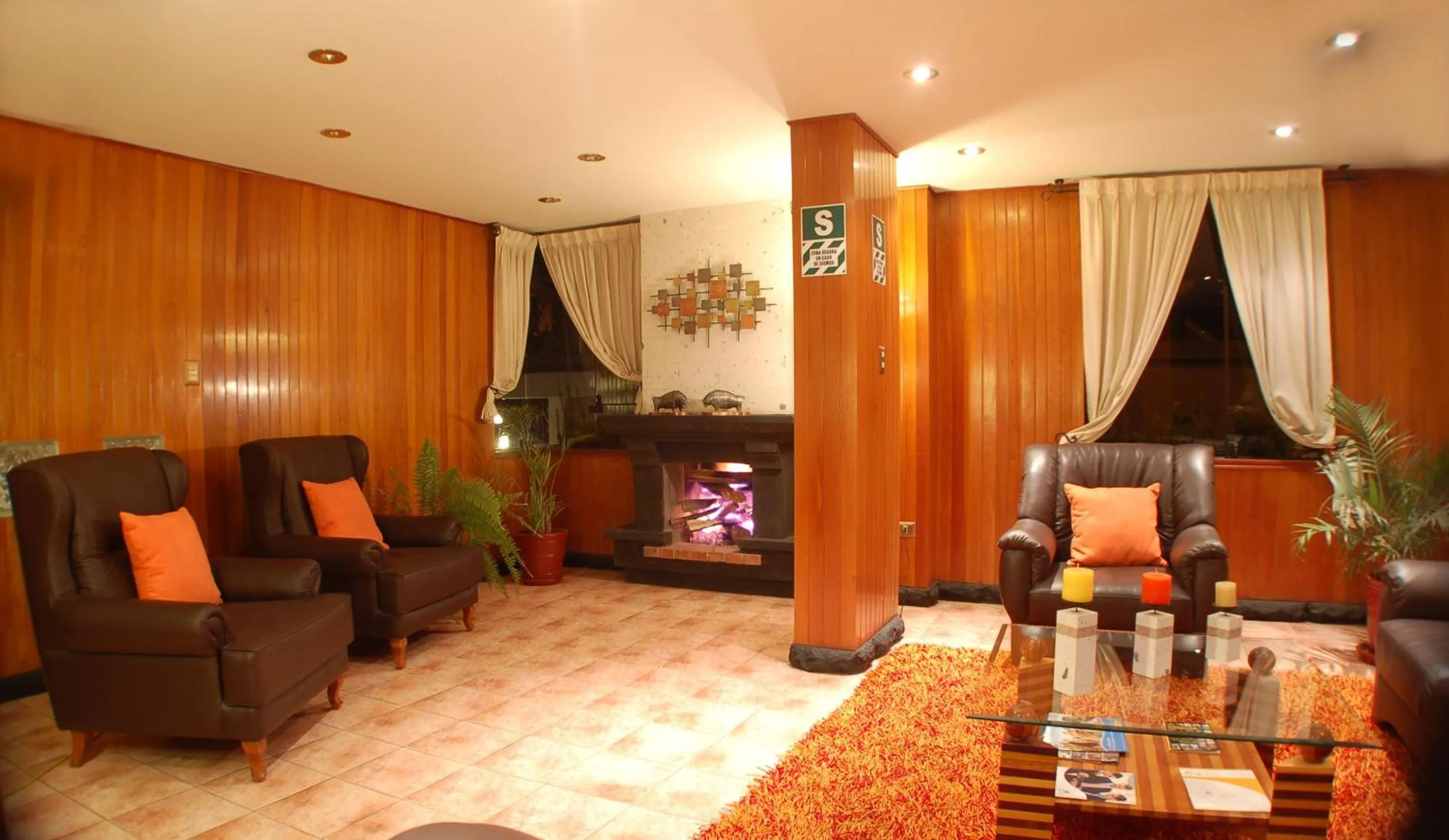 Living room in Natura Inn Hotel