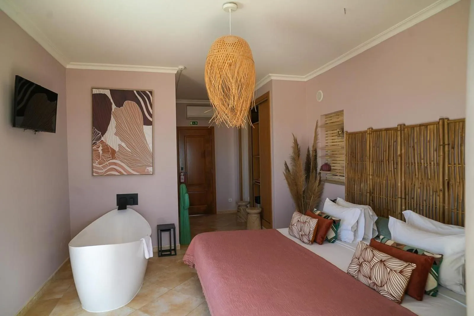 Bed in Arrifana Destination Suites