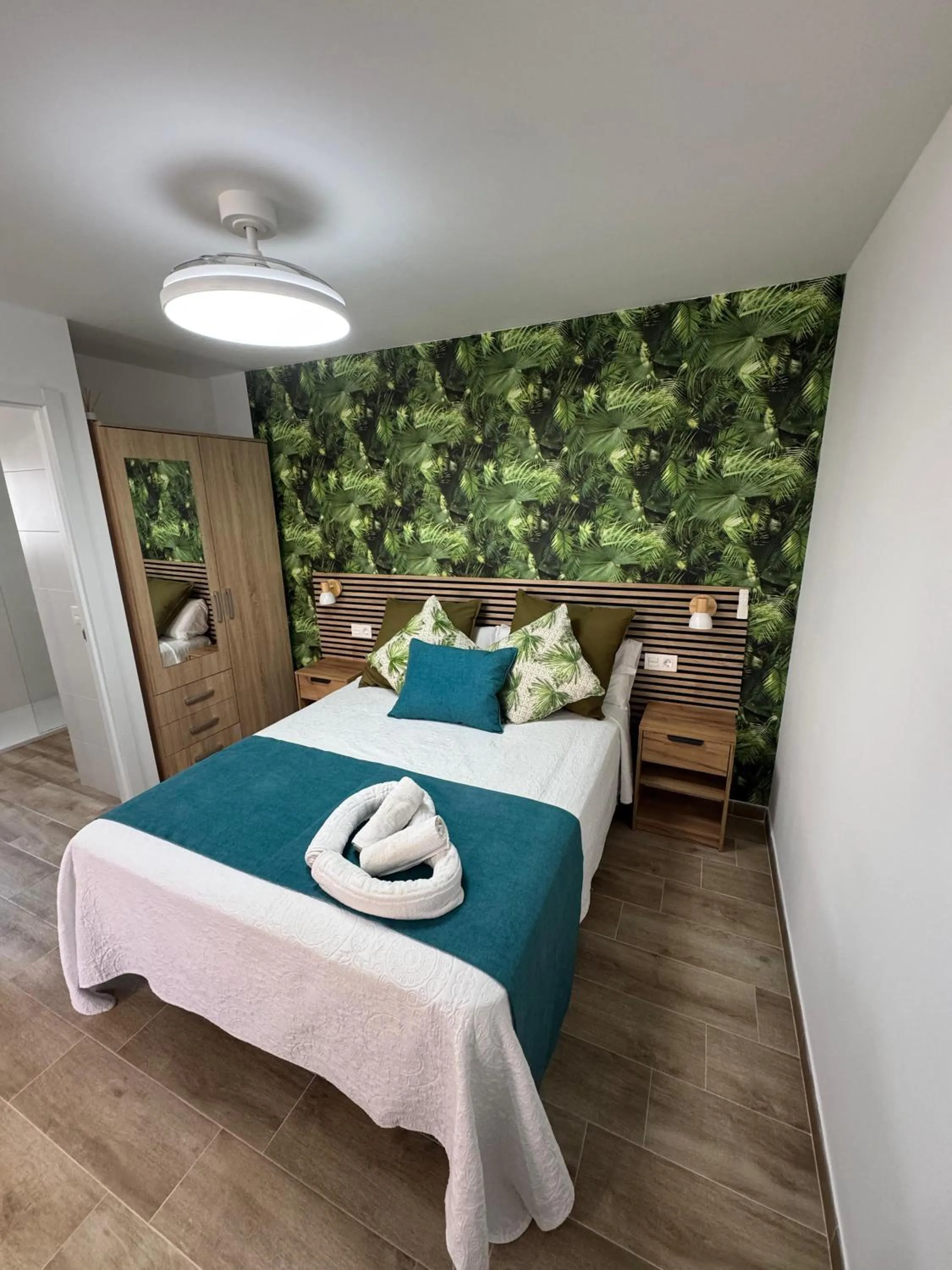 Bed in Bajondillo Beach Cozy Inns