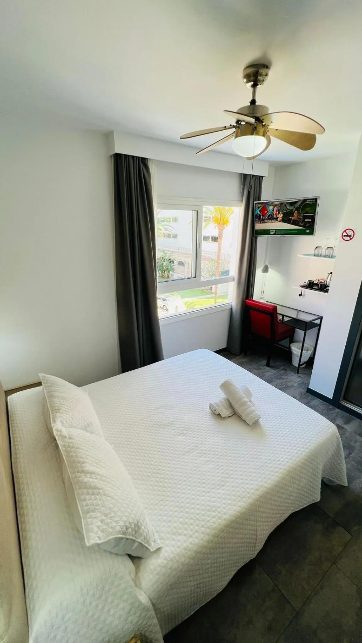 Bed in Bajondillo Beach Cozy Inns