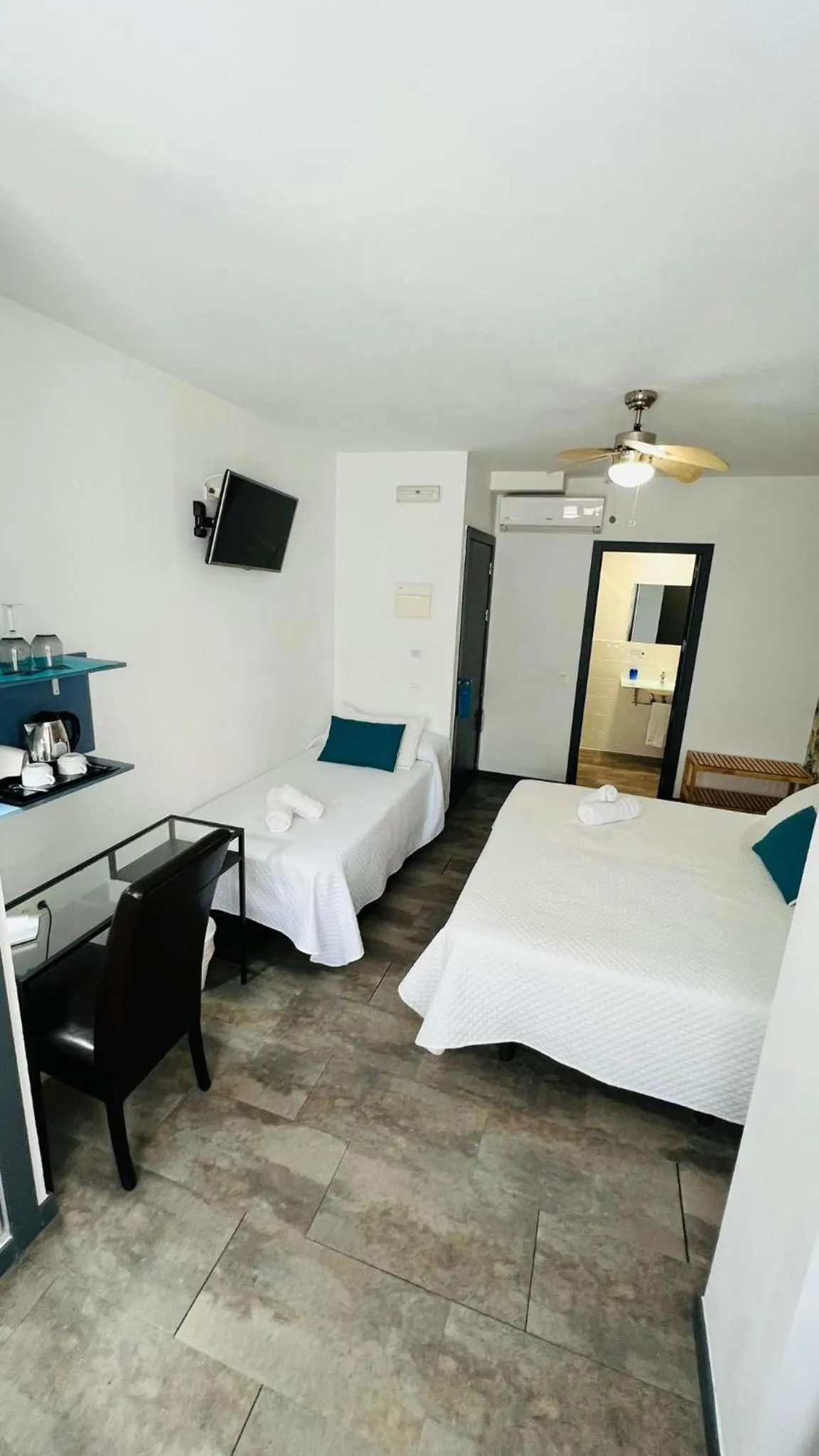 Bed in Bajondillo Beach Cozy Inns