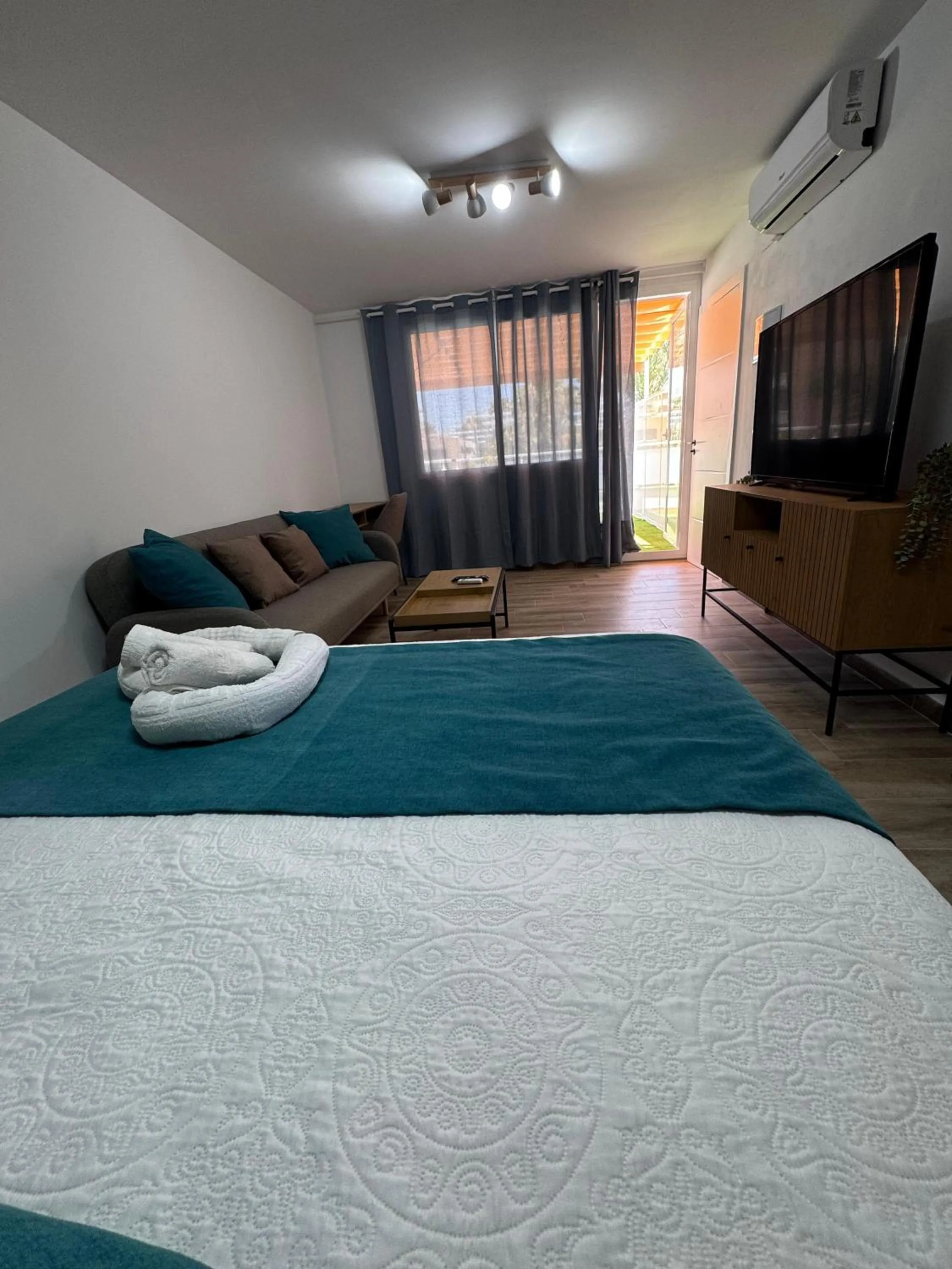 Seating area, Bed in Bajondillo Beach Cozy Inns