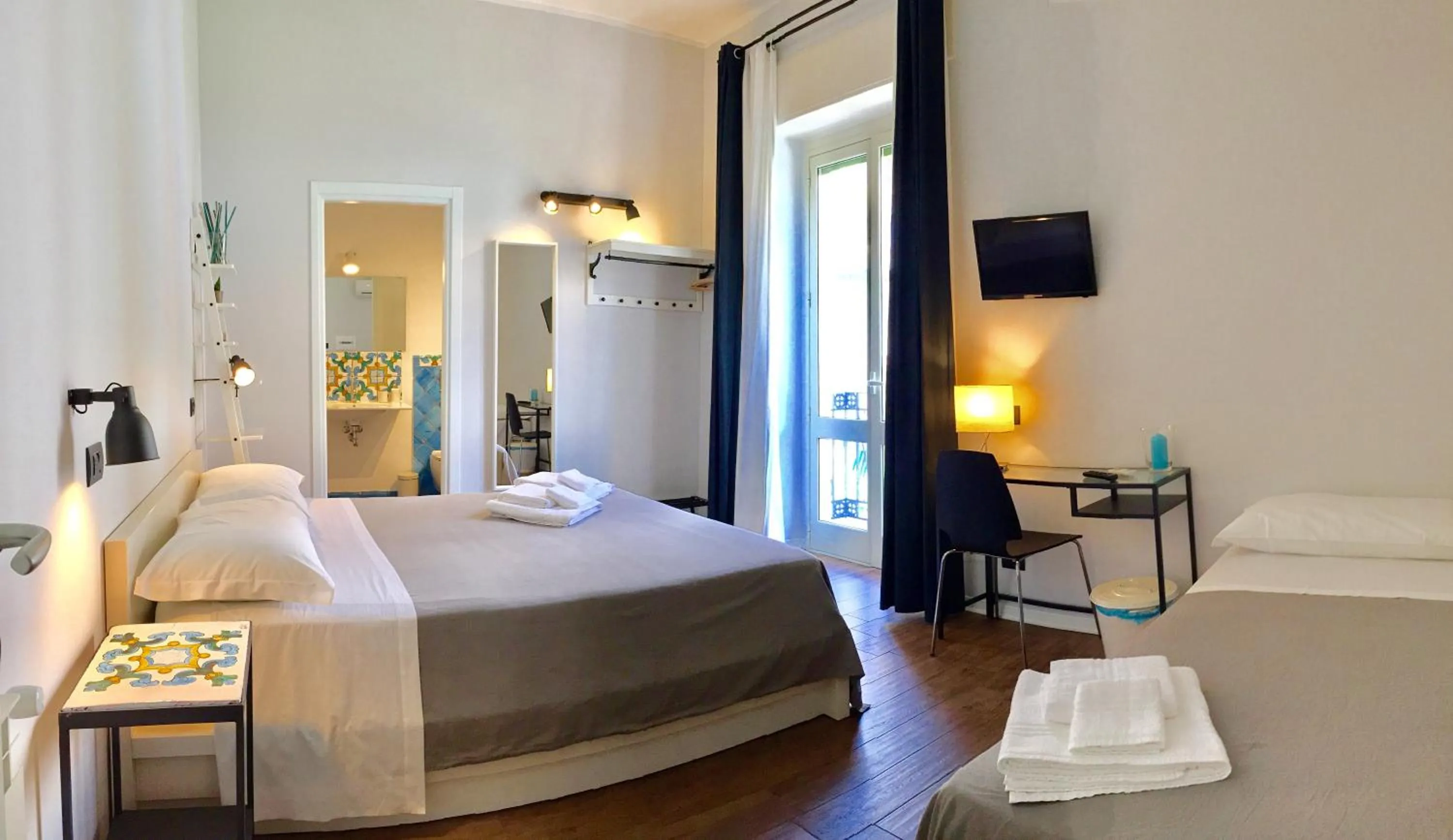 Photo of the whole room in B&B Cortile Umberto I