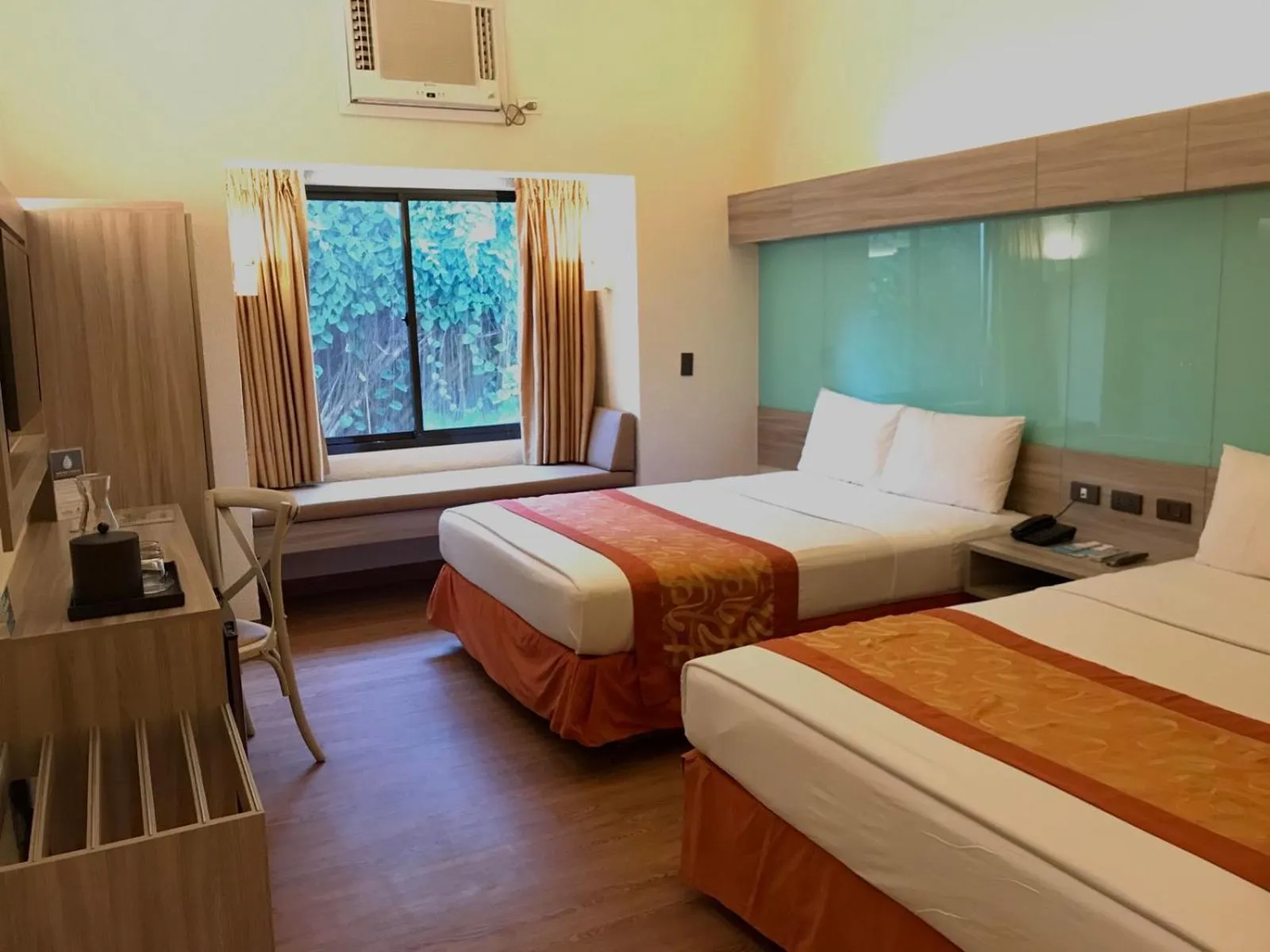 Bed in Microtel by Wyndham Boracay