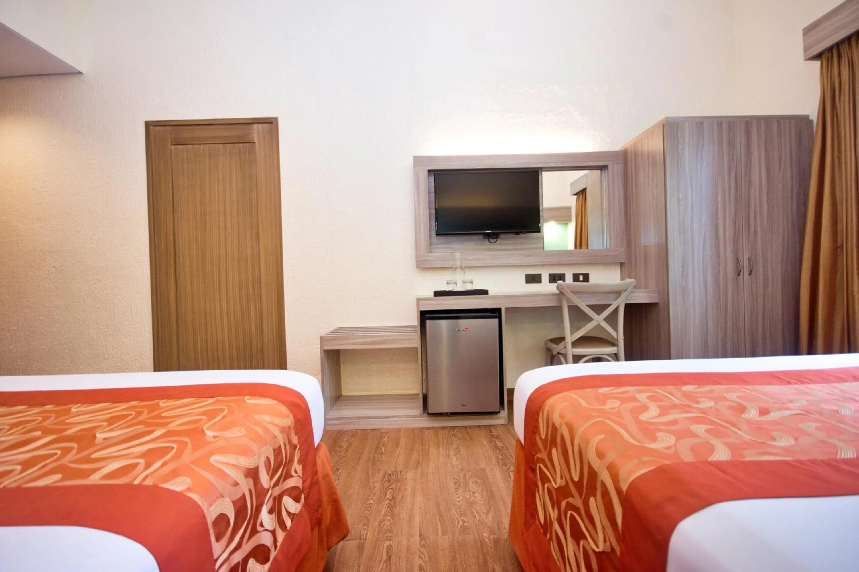 Living room, Bed in Microtel by Wyndham Boracay