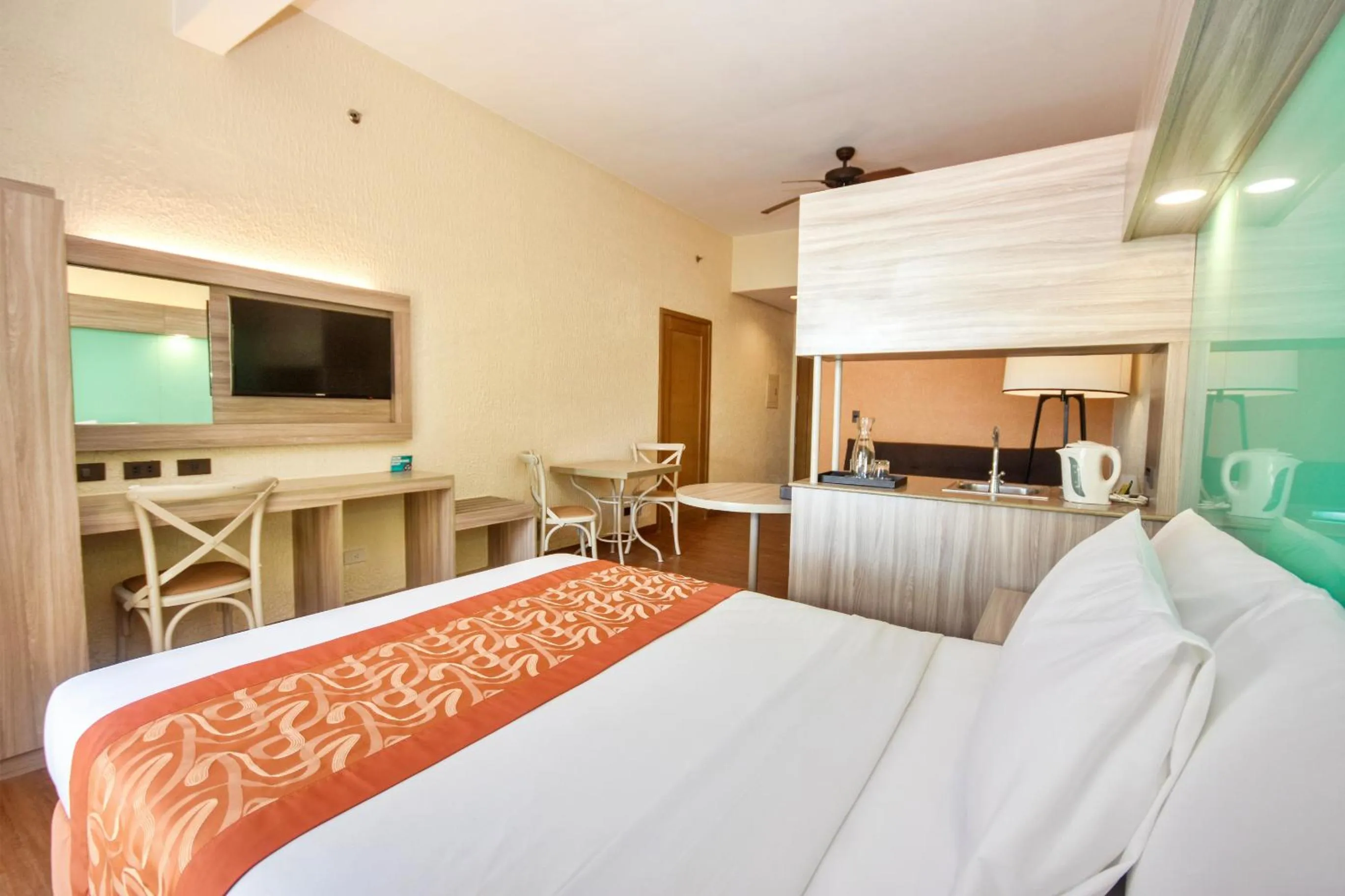 Bed in Microtel by Wyndham Boracay