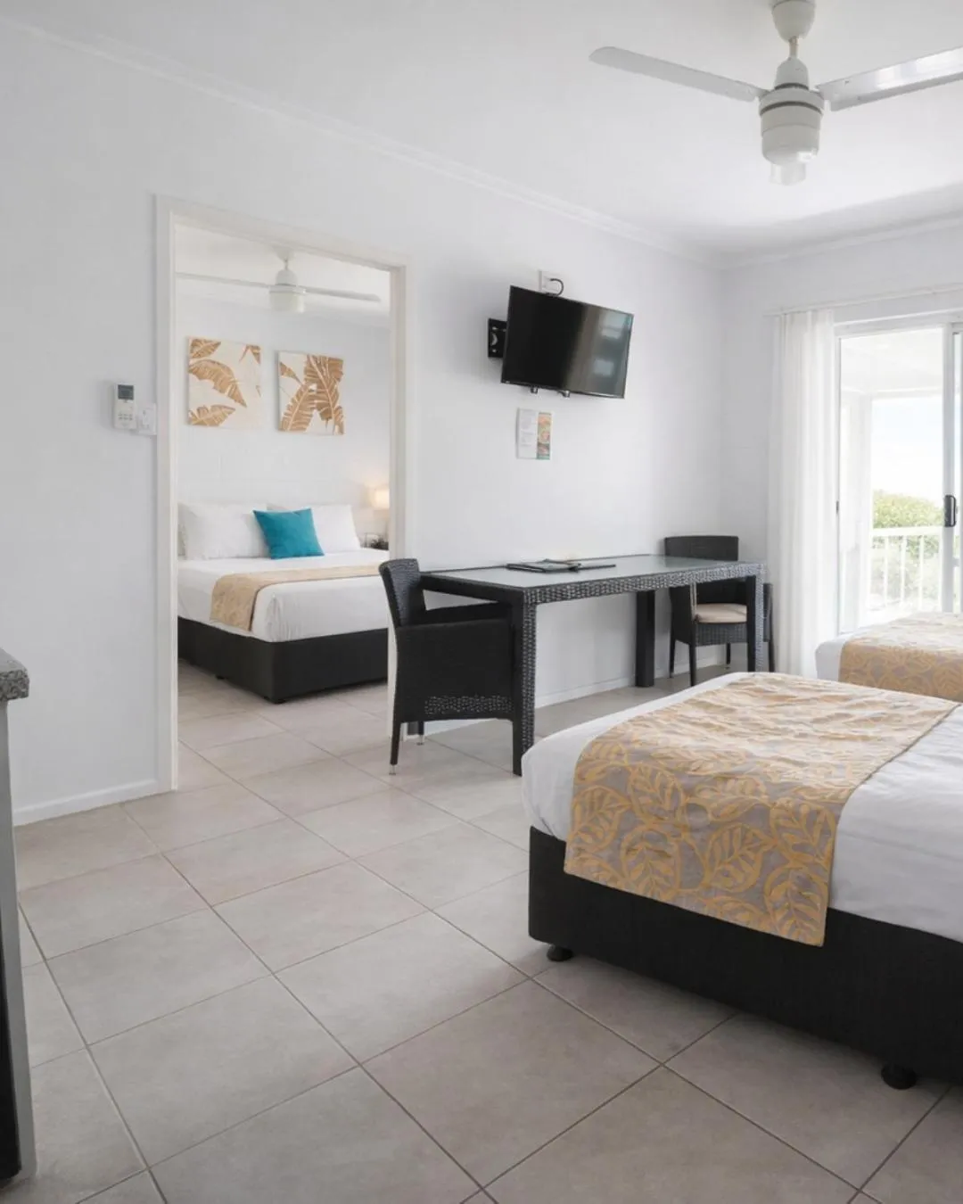 Bed in Colonial Palms Motor Inn