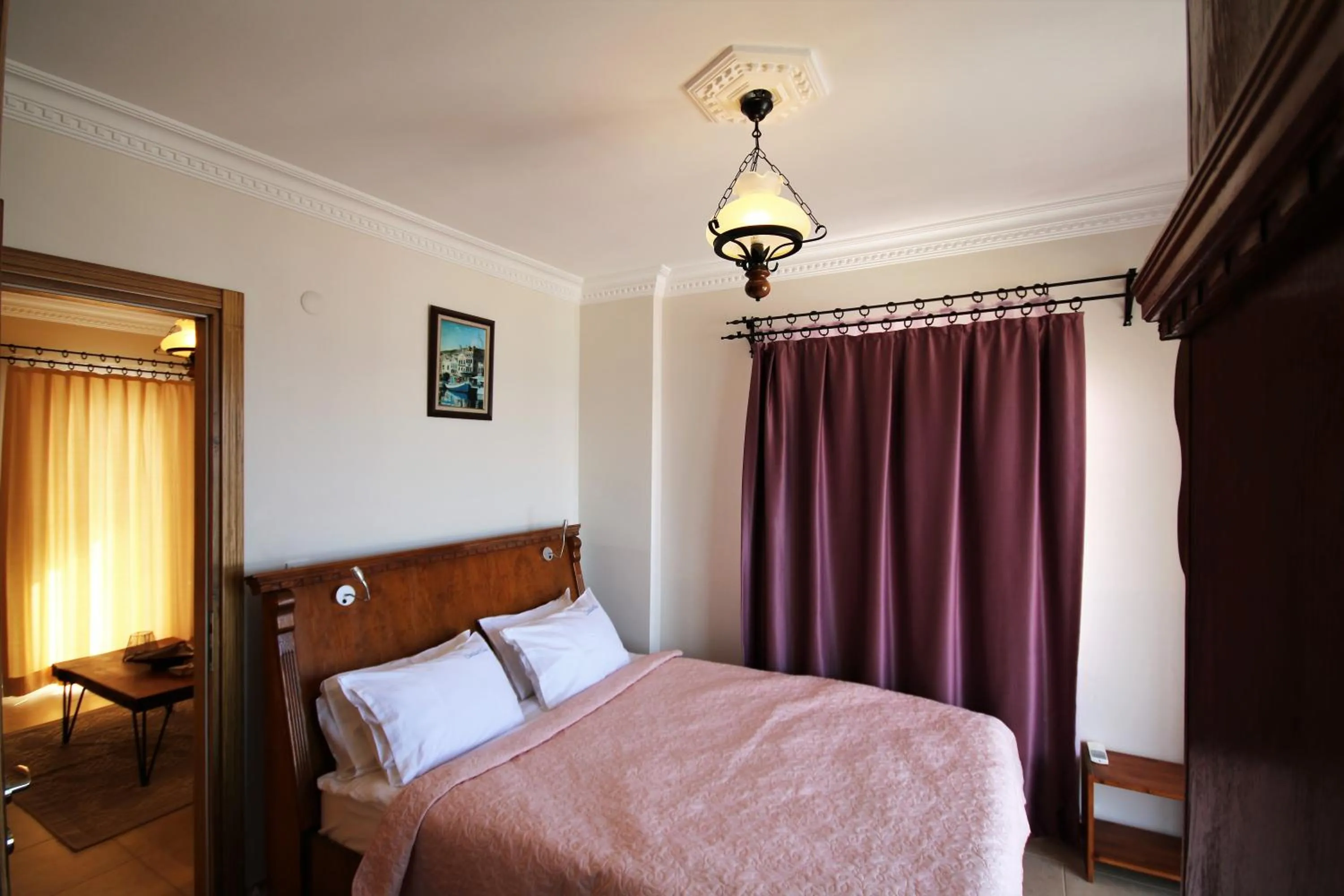 Bed in Cundavilla Hotel & Suites