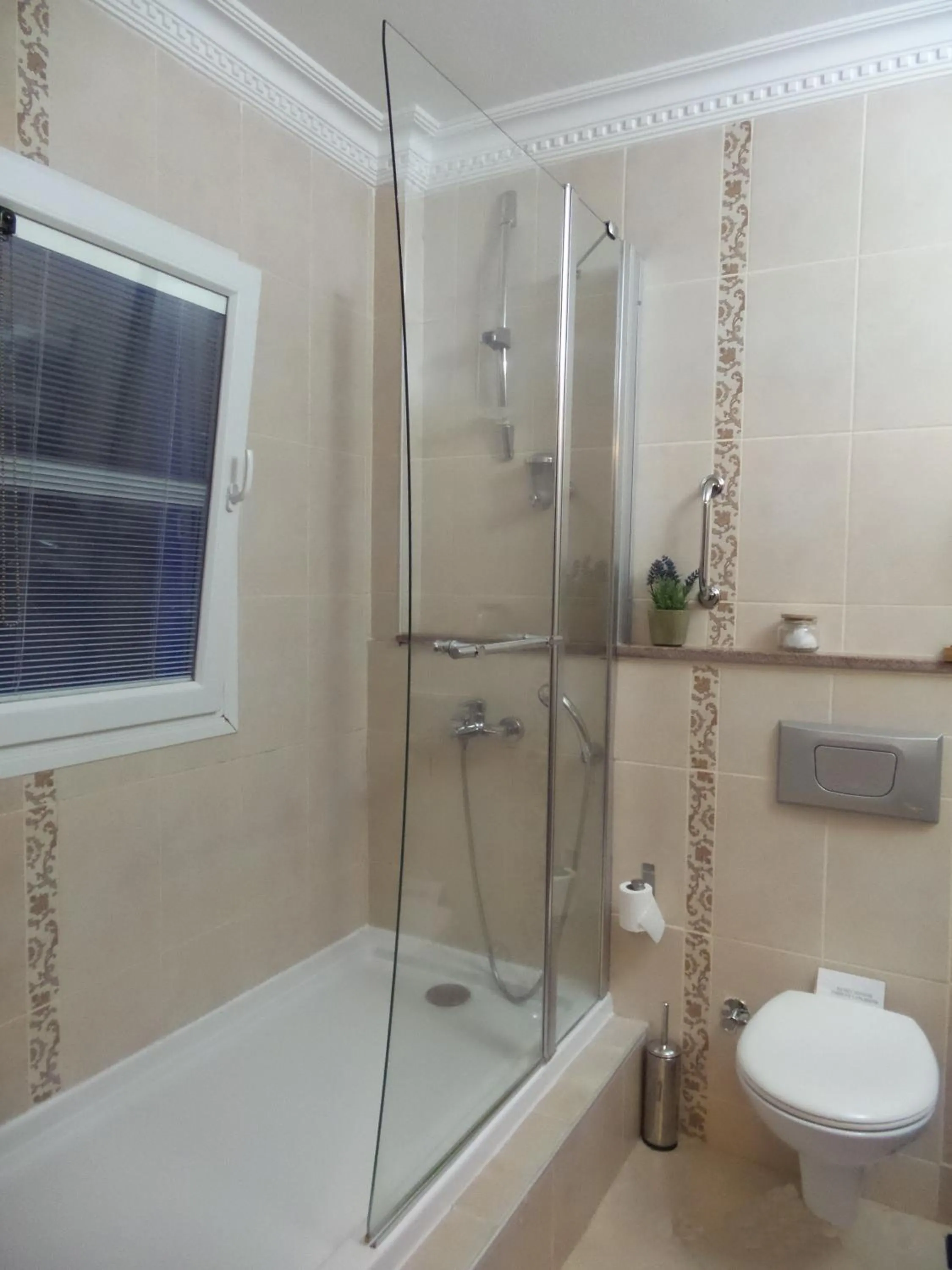 Bathroom in Cundavilla Hotel & Suites