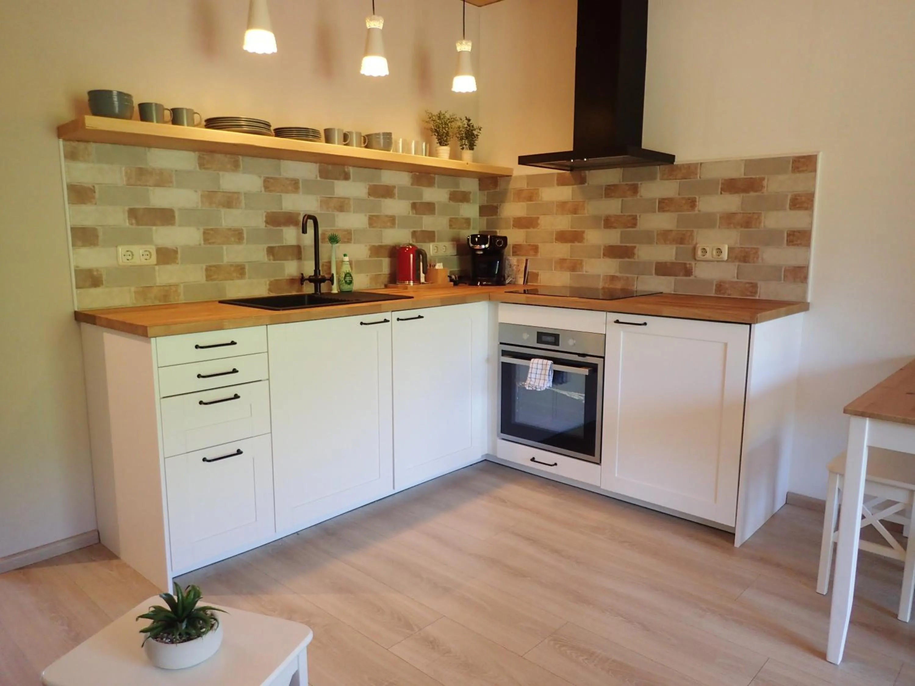 Kitchen or kitchenette in Hotel Sonnenlicht Maria Alm