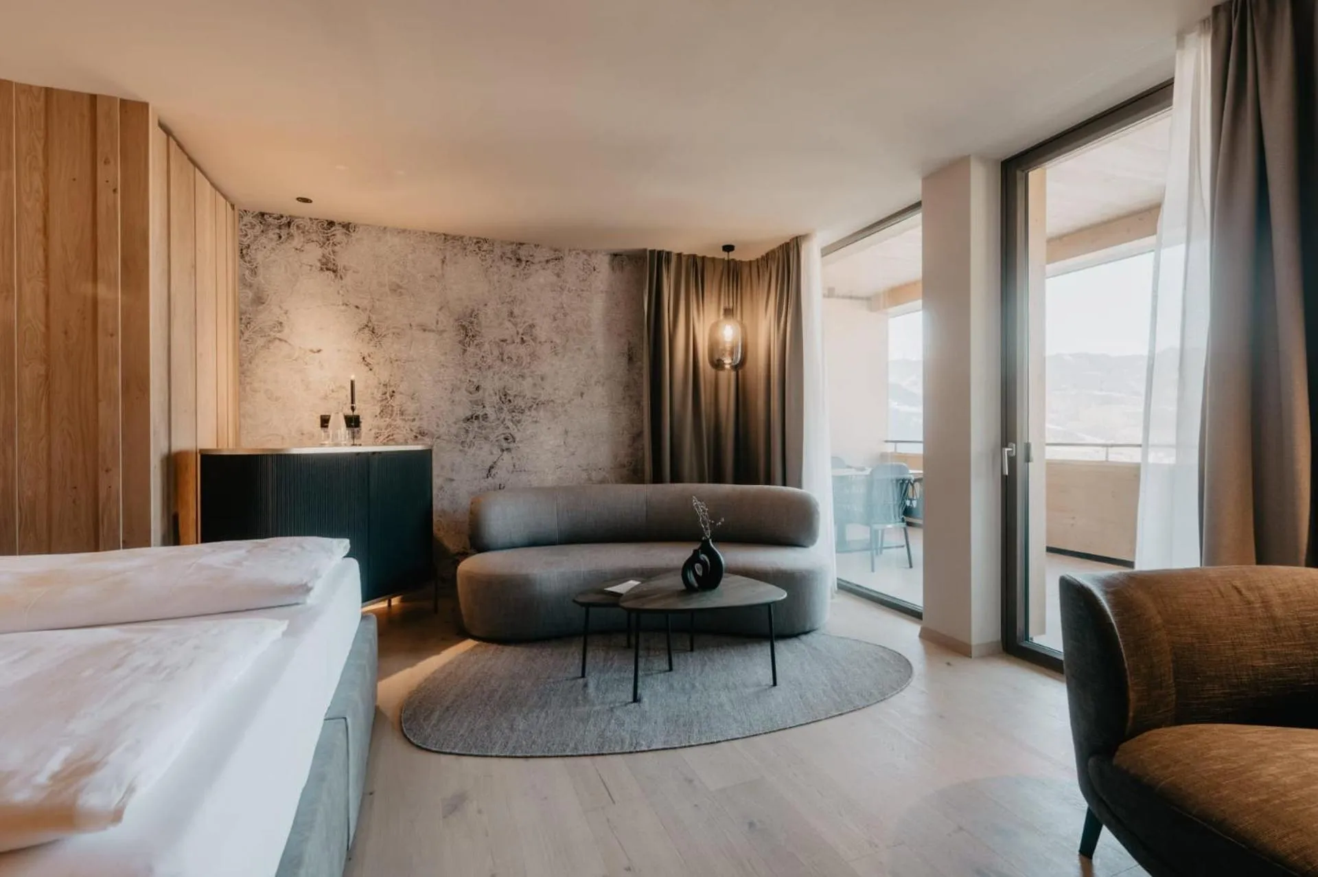 Living room, Bed in Hotel Berghof - St Johann in Salzburg