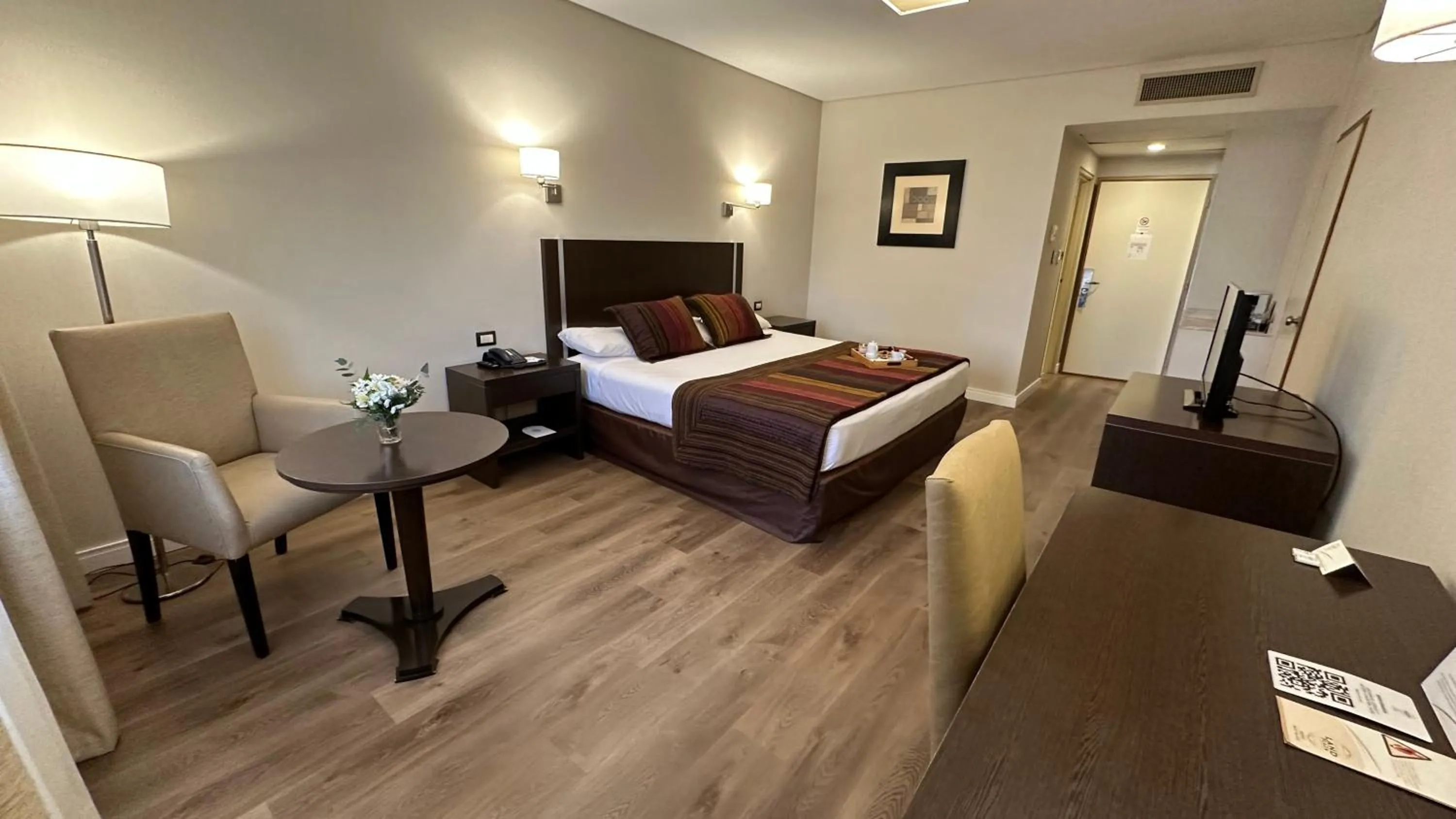 Bed in Land Plaza Hotel