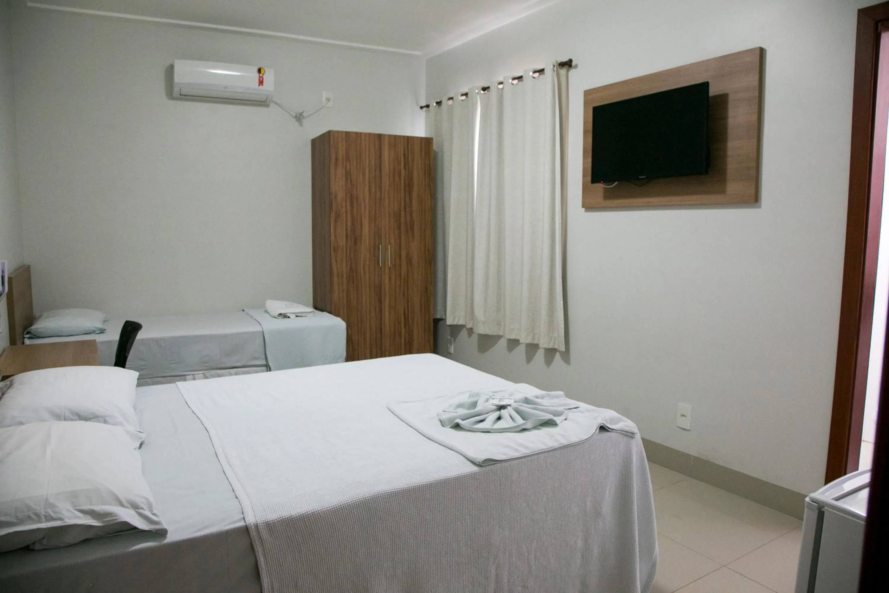 Bed in Cemarim Hotel