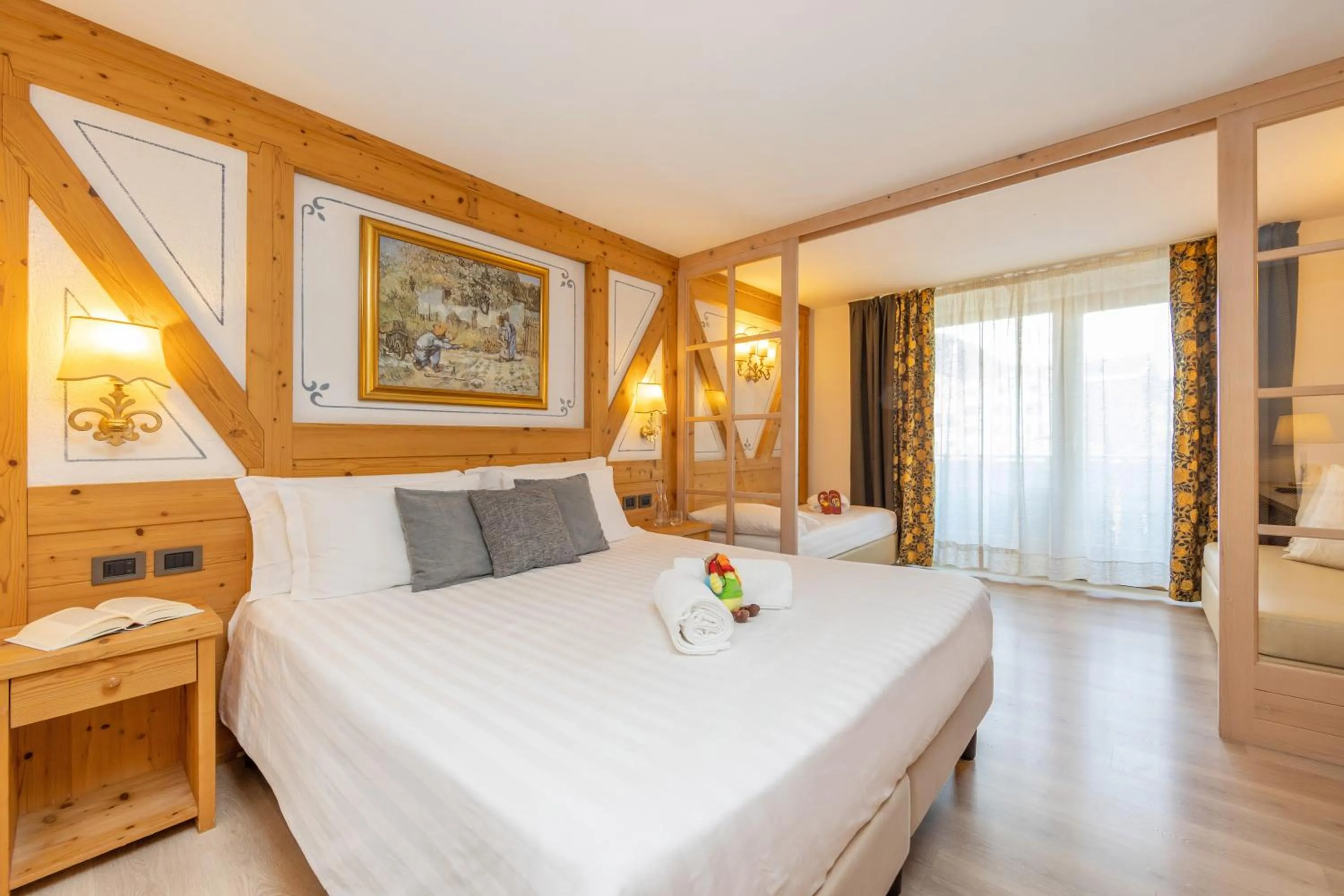 Bed in Piz Galin Grand Hotel Family & Wellness