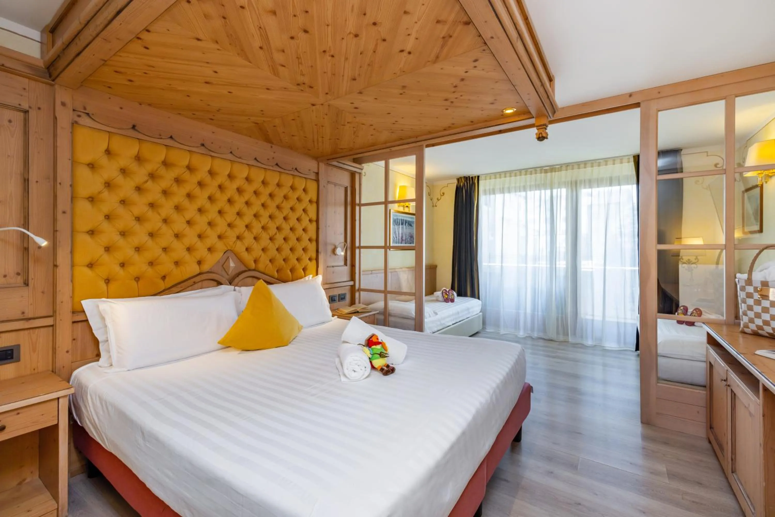 Bed in Piz Galin Grand Hotel Family & Wellness