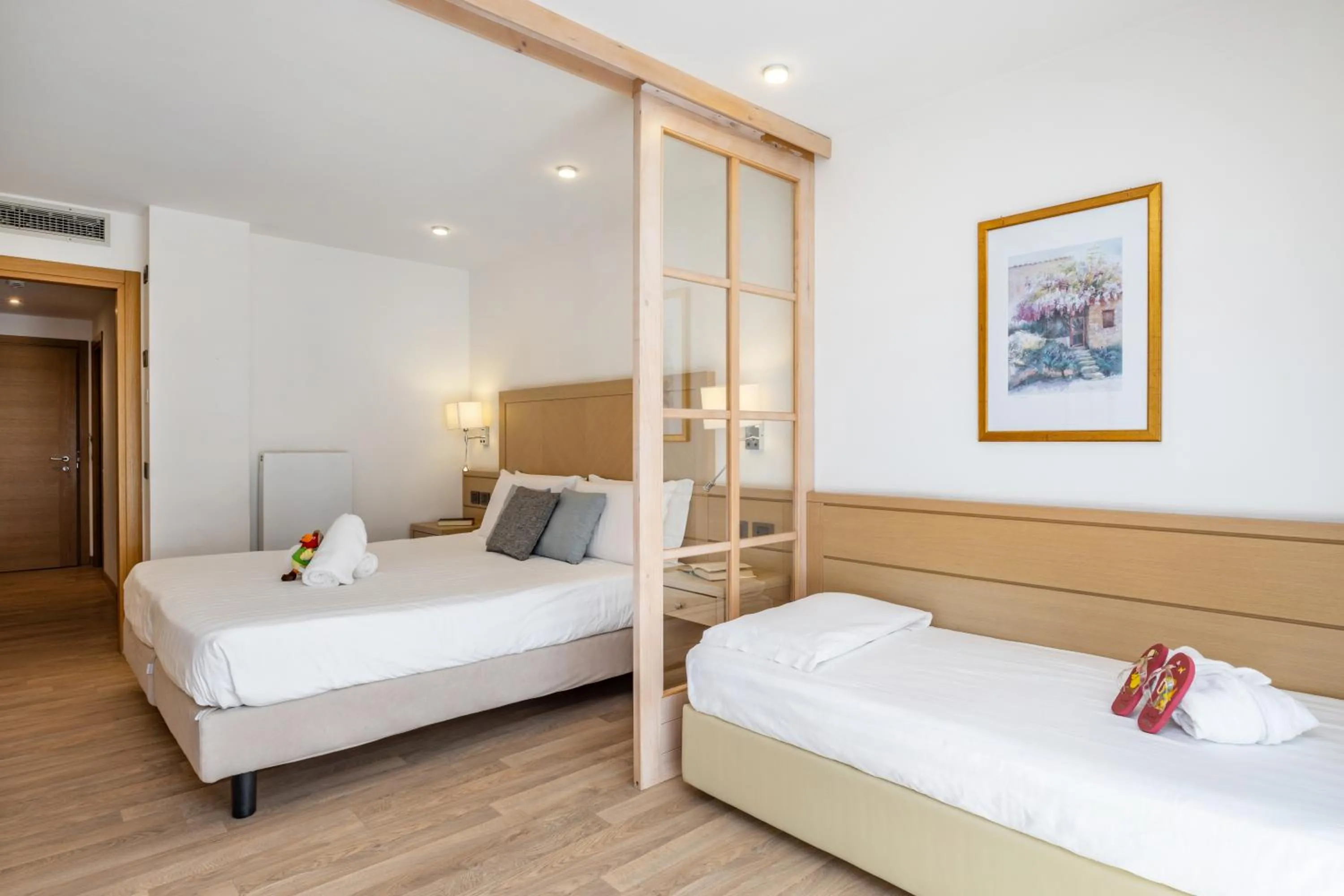 Bed in Piz Galin Grand Hotel Family & Wellness