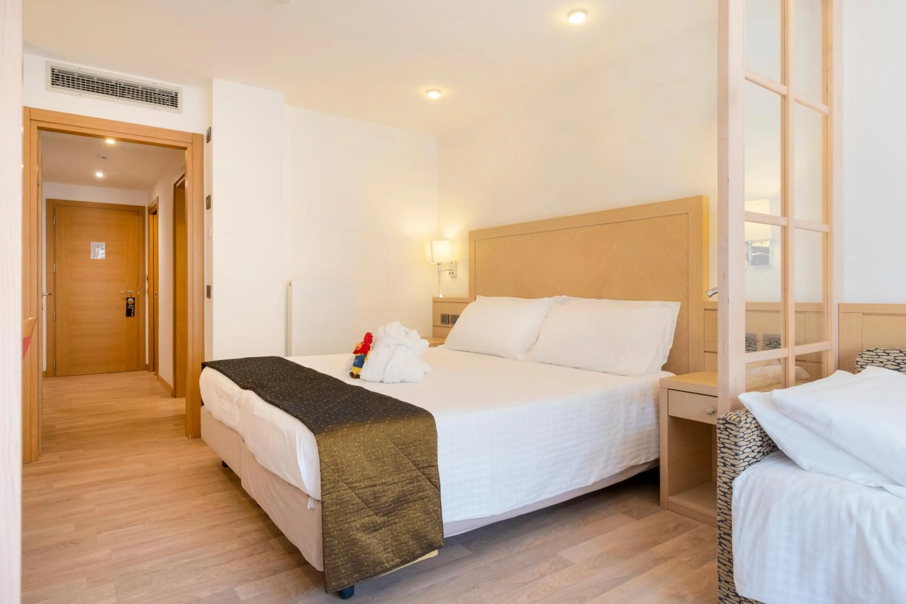 Bed in Piz Galin Grand Hotel Family & Wellness