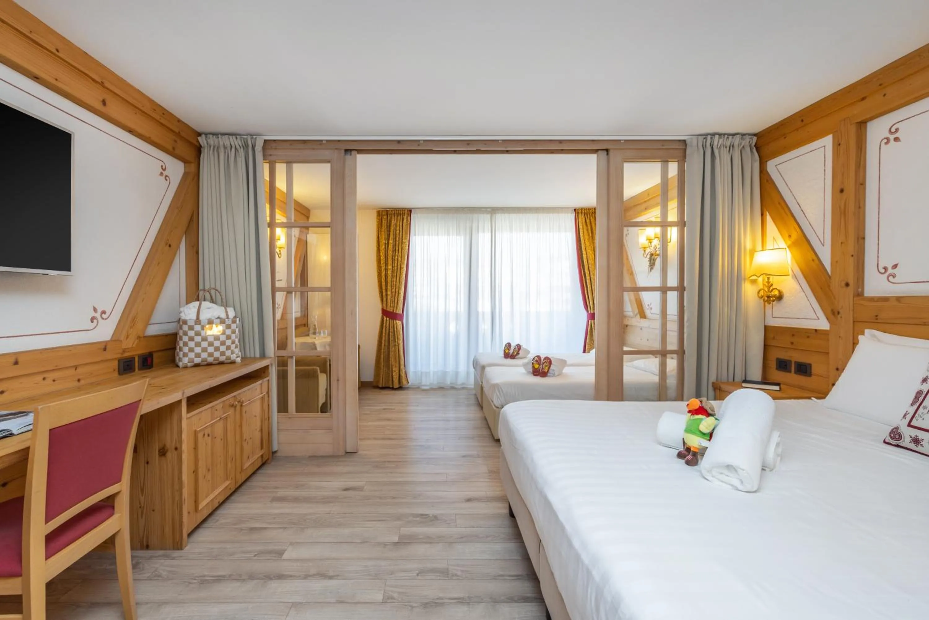 Bed in Piz Galin Grand Hotel Family & Wellness