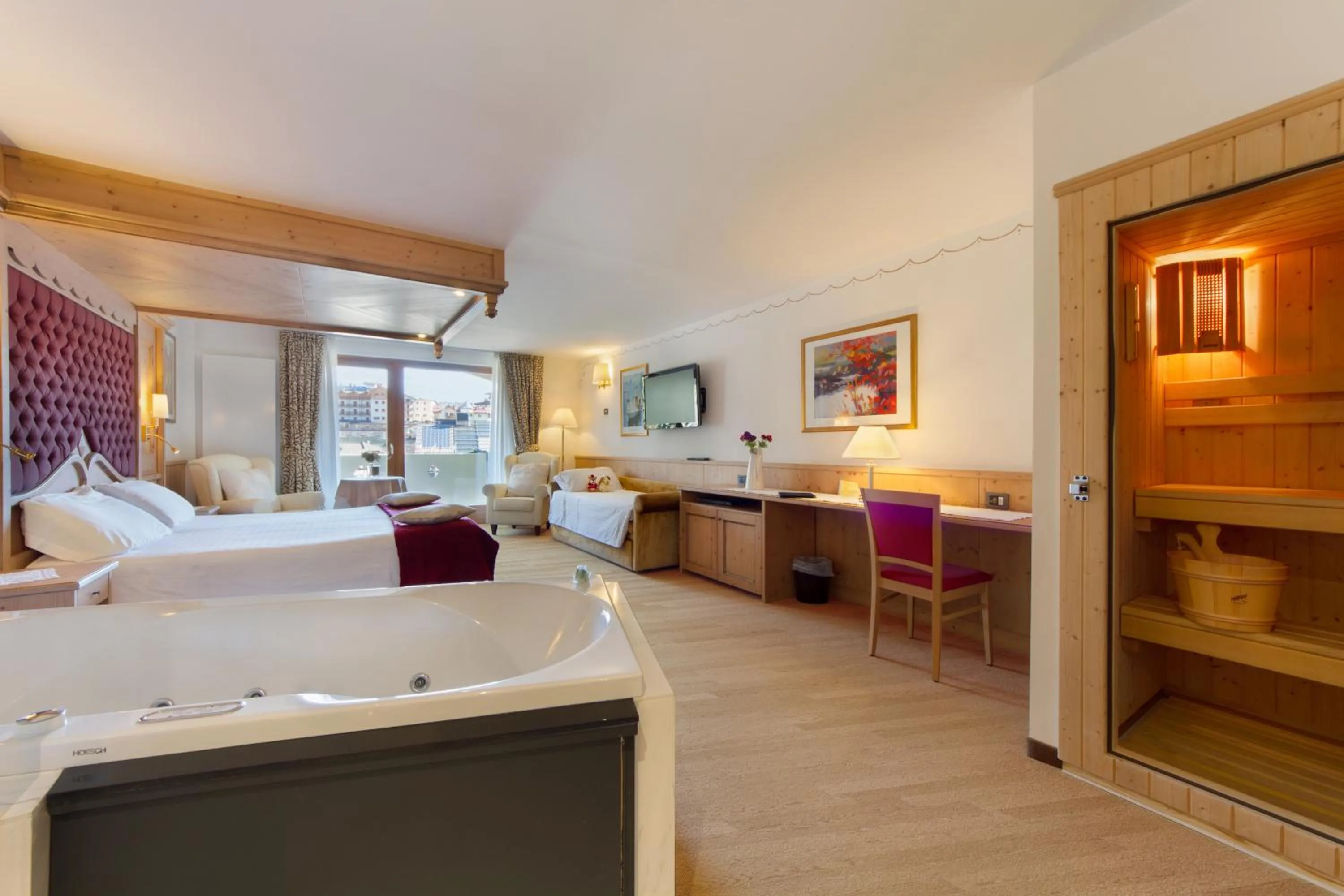 Bed in Piz Galin Grand Hotel Family & Wellness