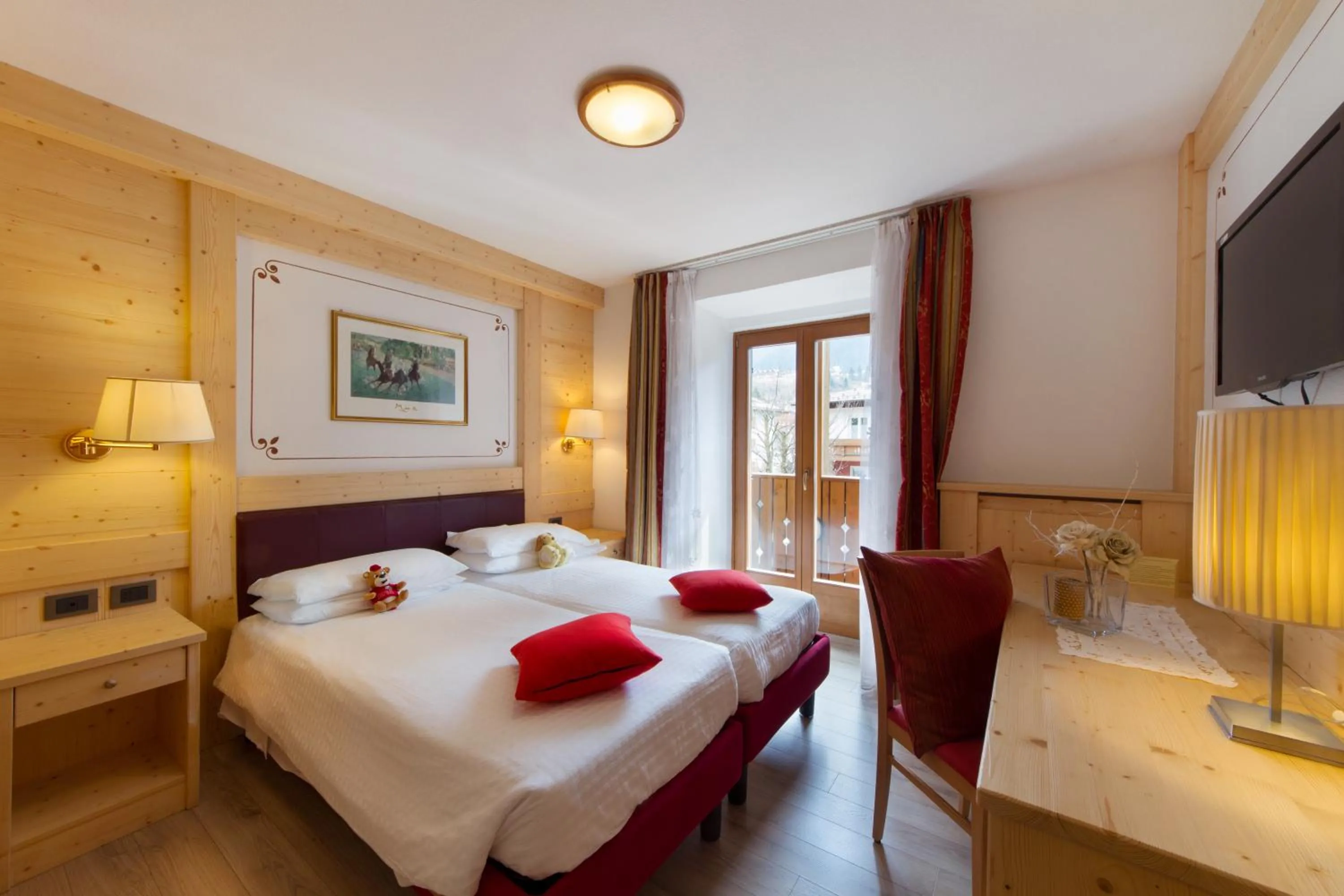 Day, Bed in Piz Galin Grand Hotel Family & Wellness