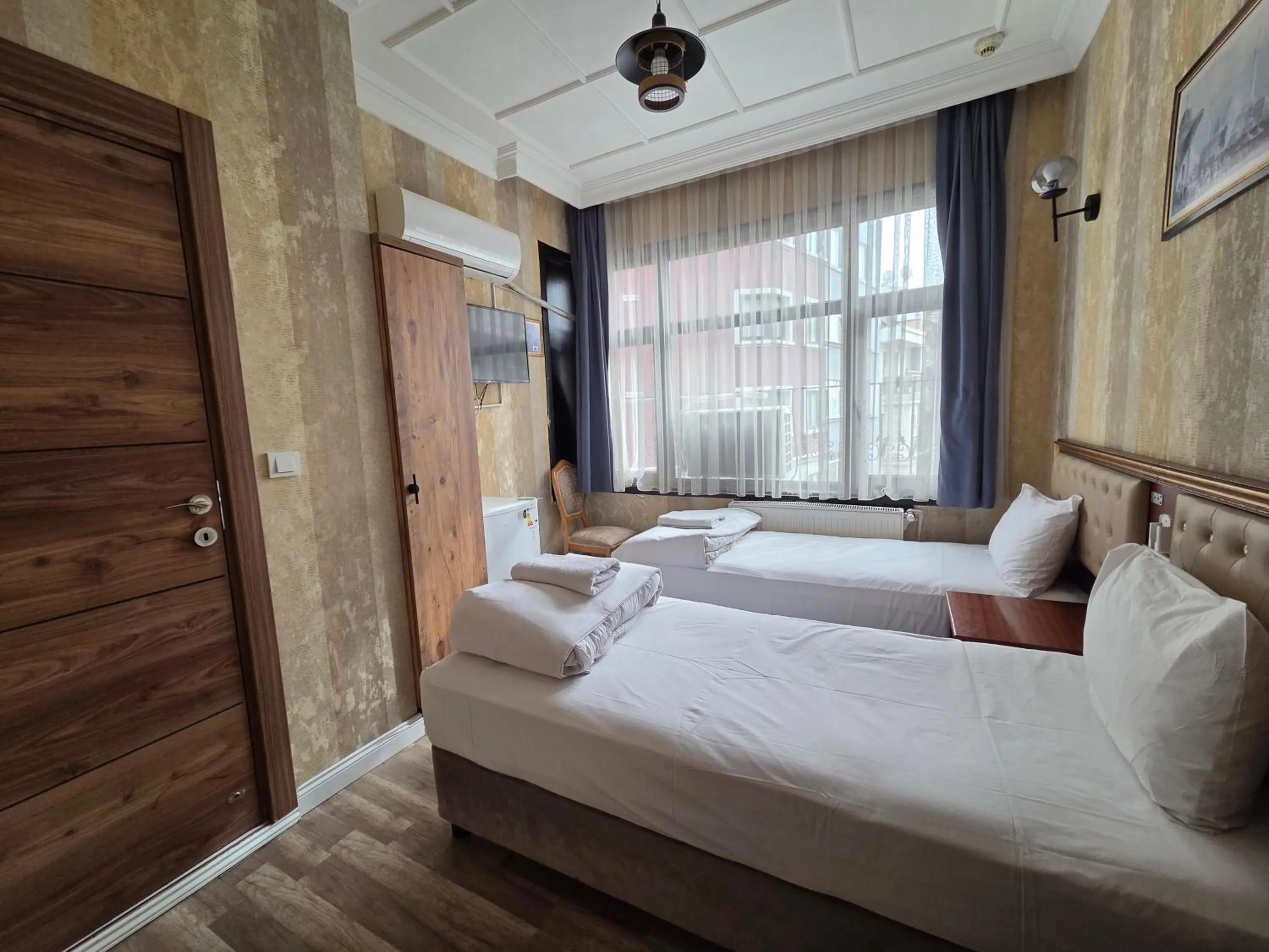 Bed in Asitane Life Hotel