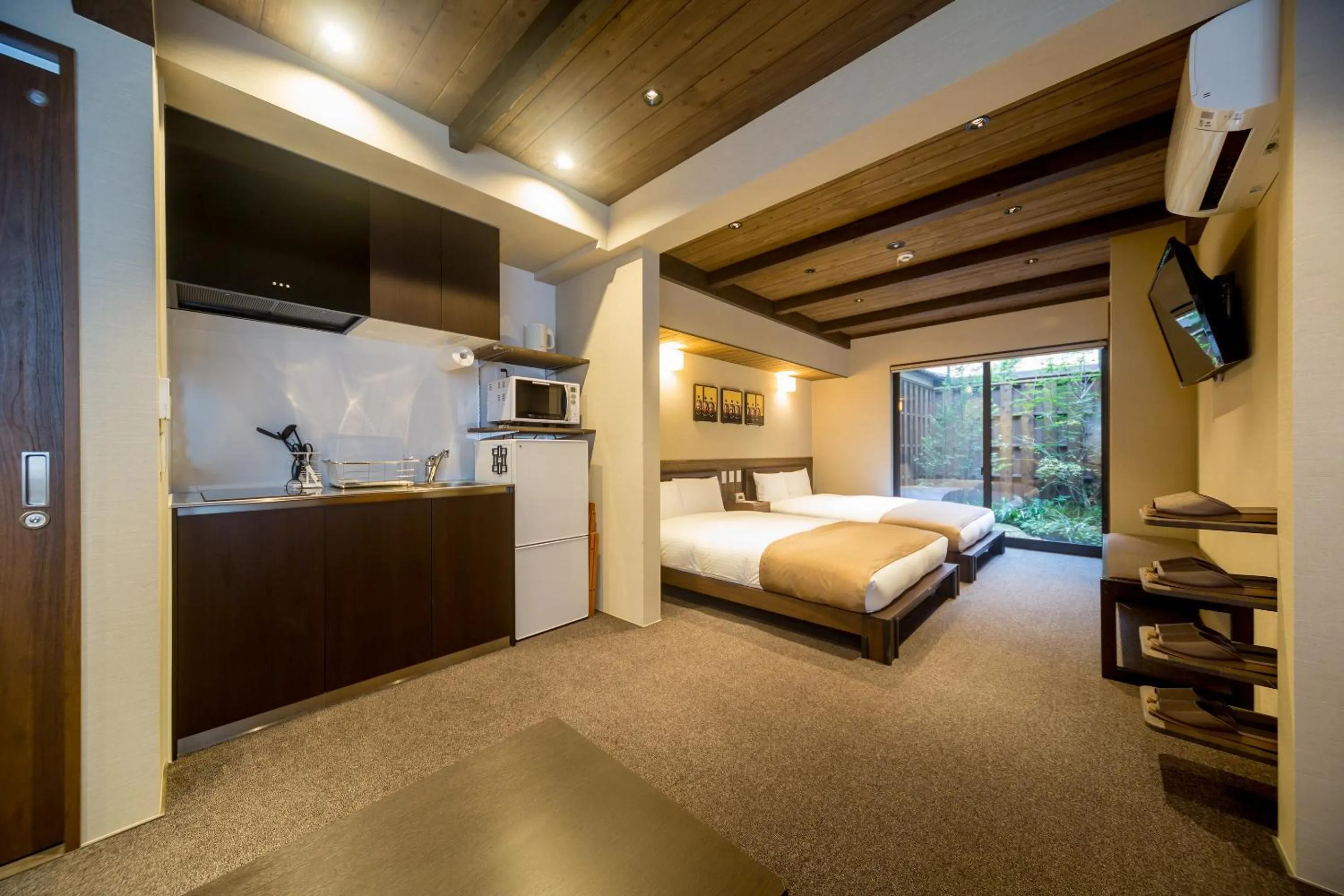 Kitchen or kitchenette, Bed in RESI STAY NISHIKI