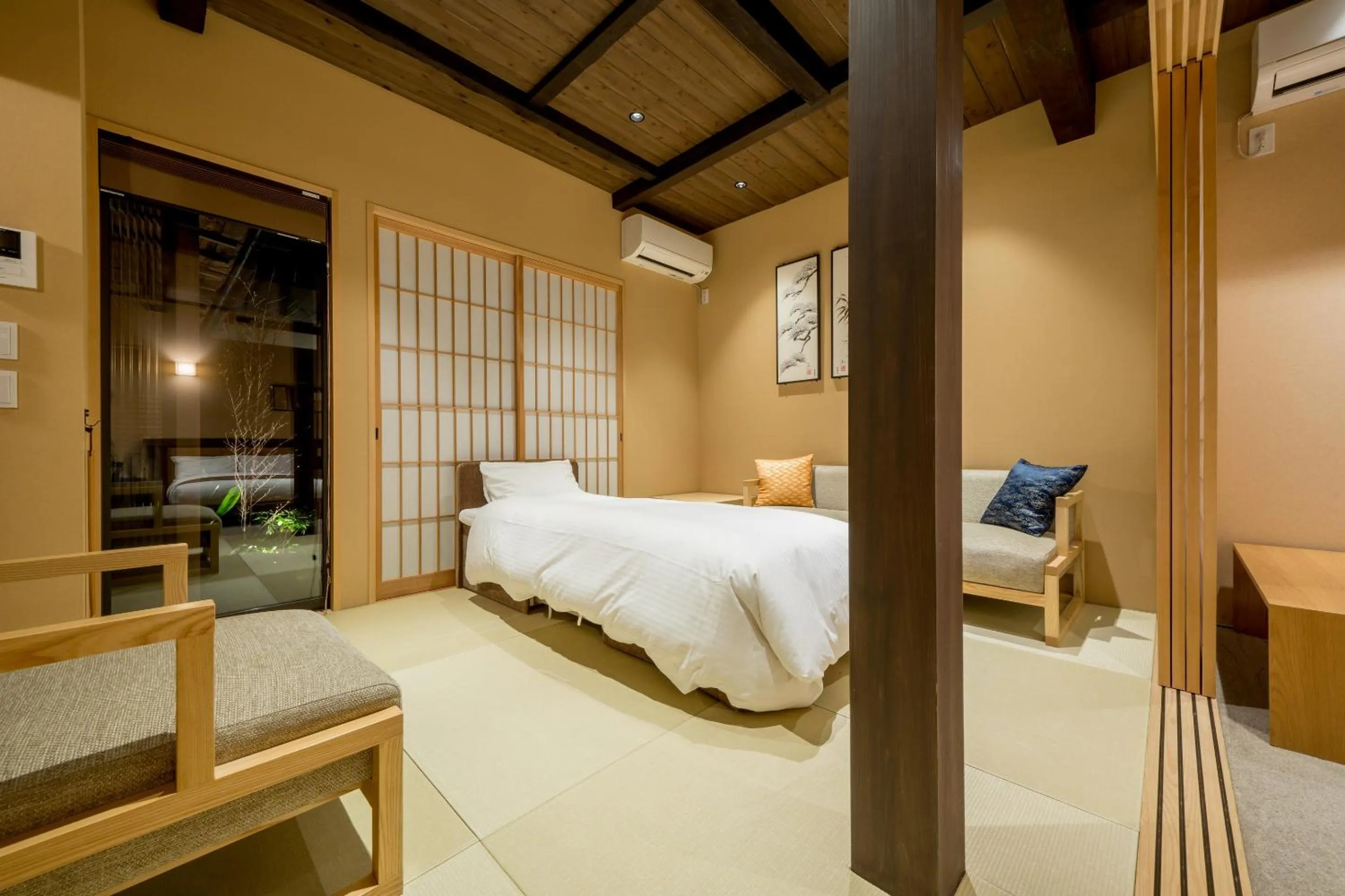 Bed in RESI STAY NISHIKI