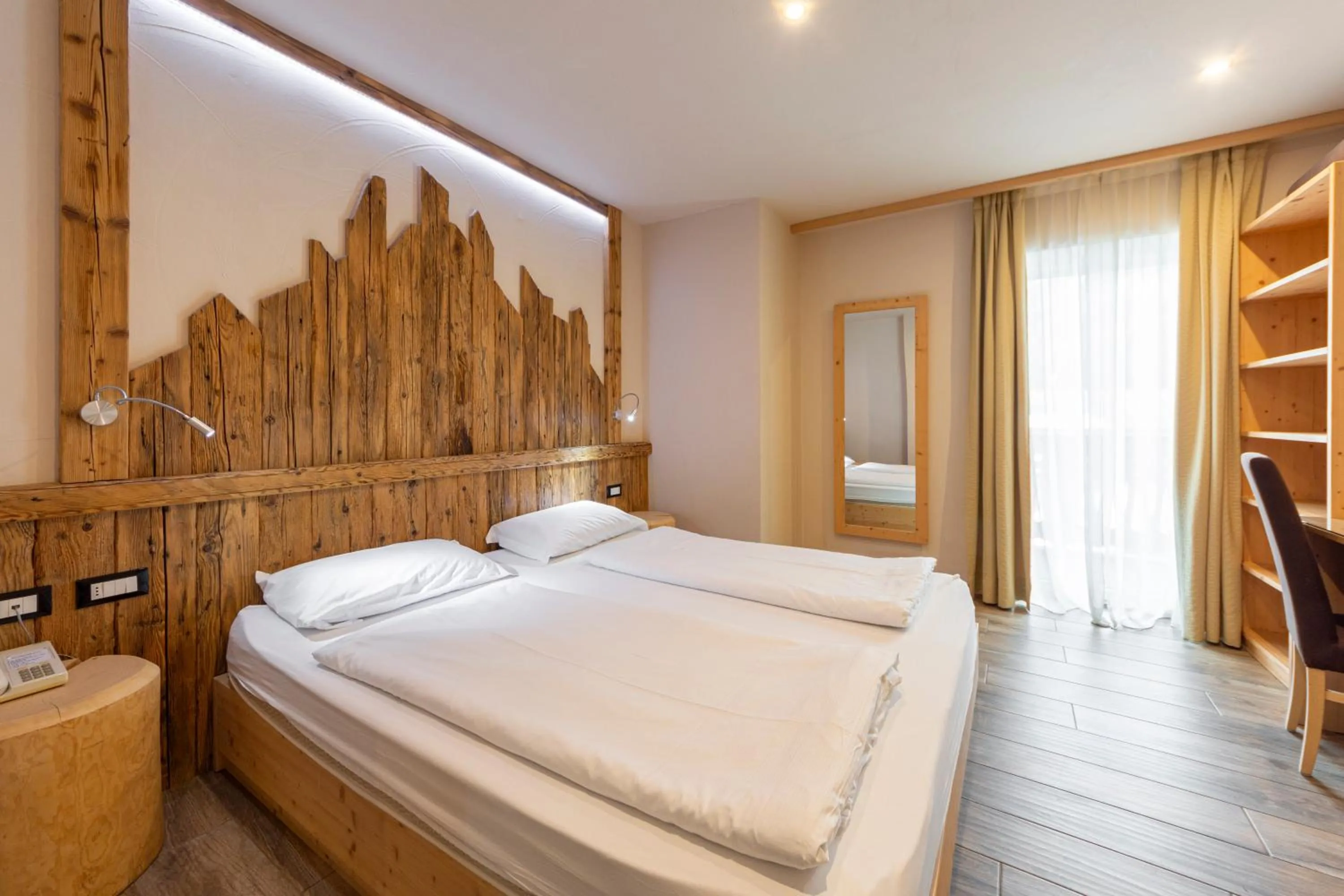 Bed in Park Hotel Avisio