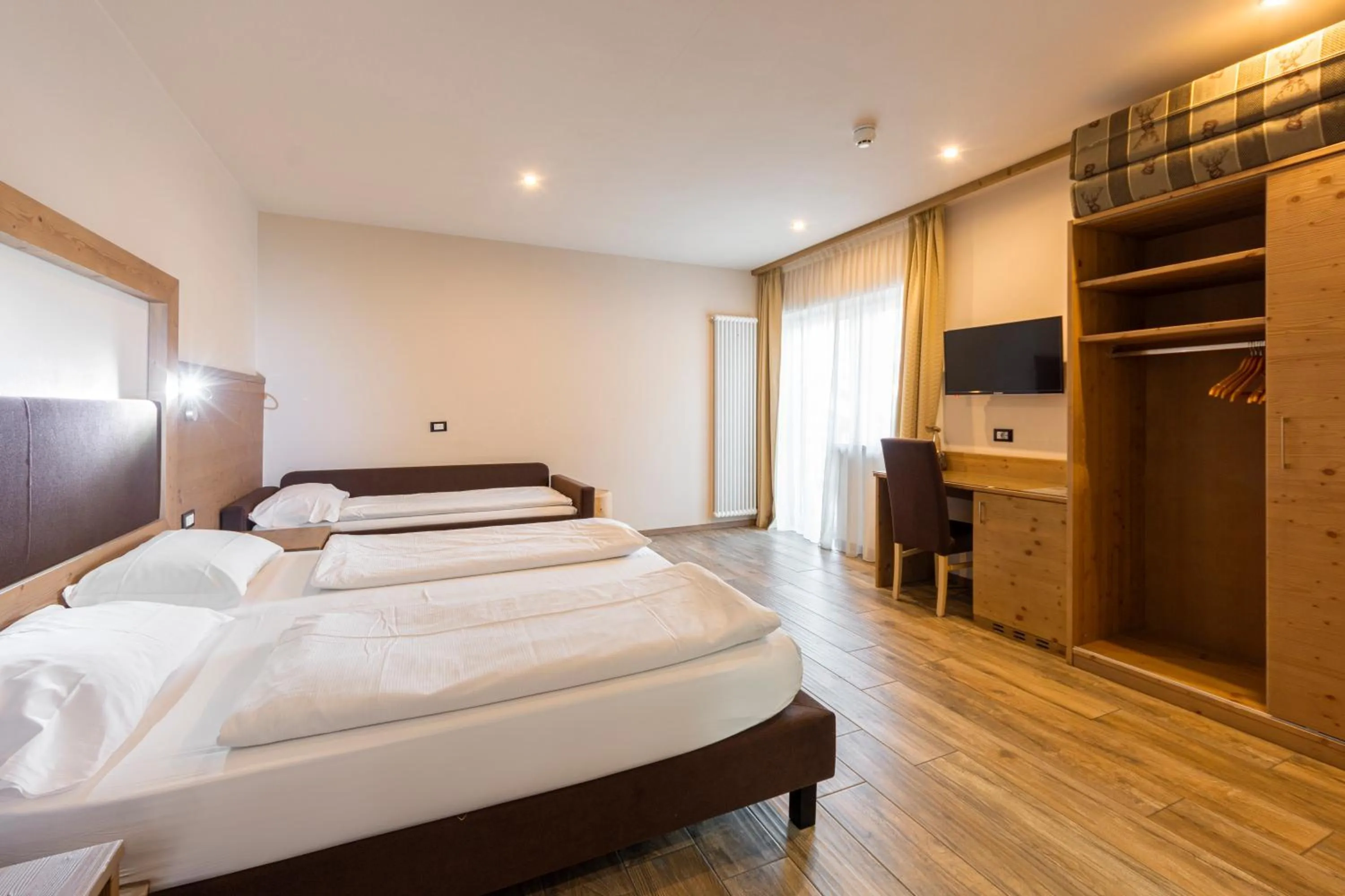 Bed in Park Hotel Avisio