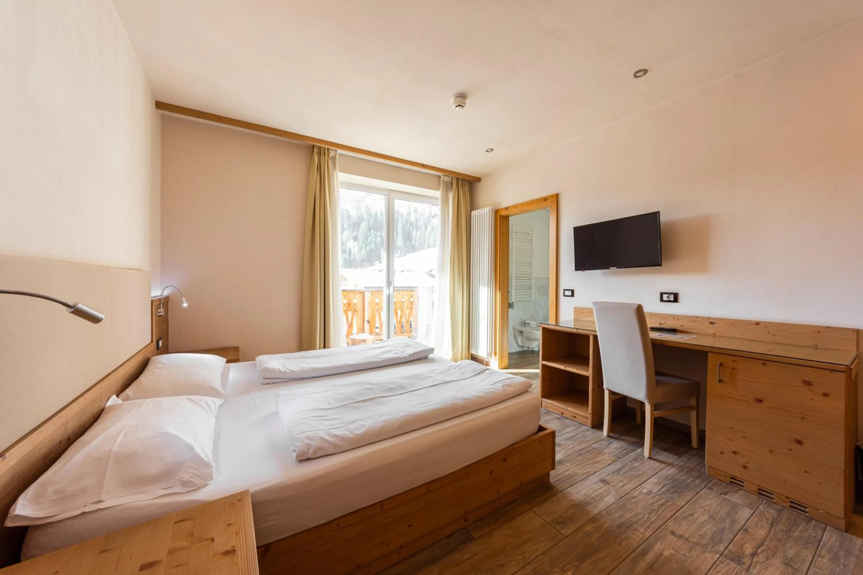 Bed in Park Hotel Avisio