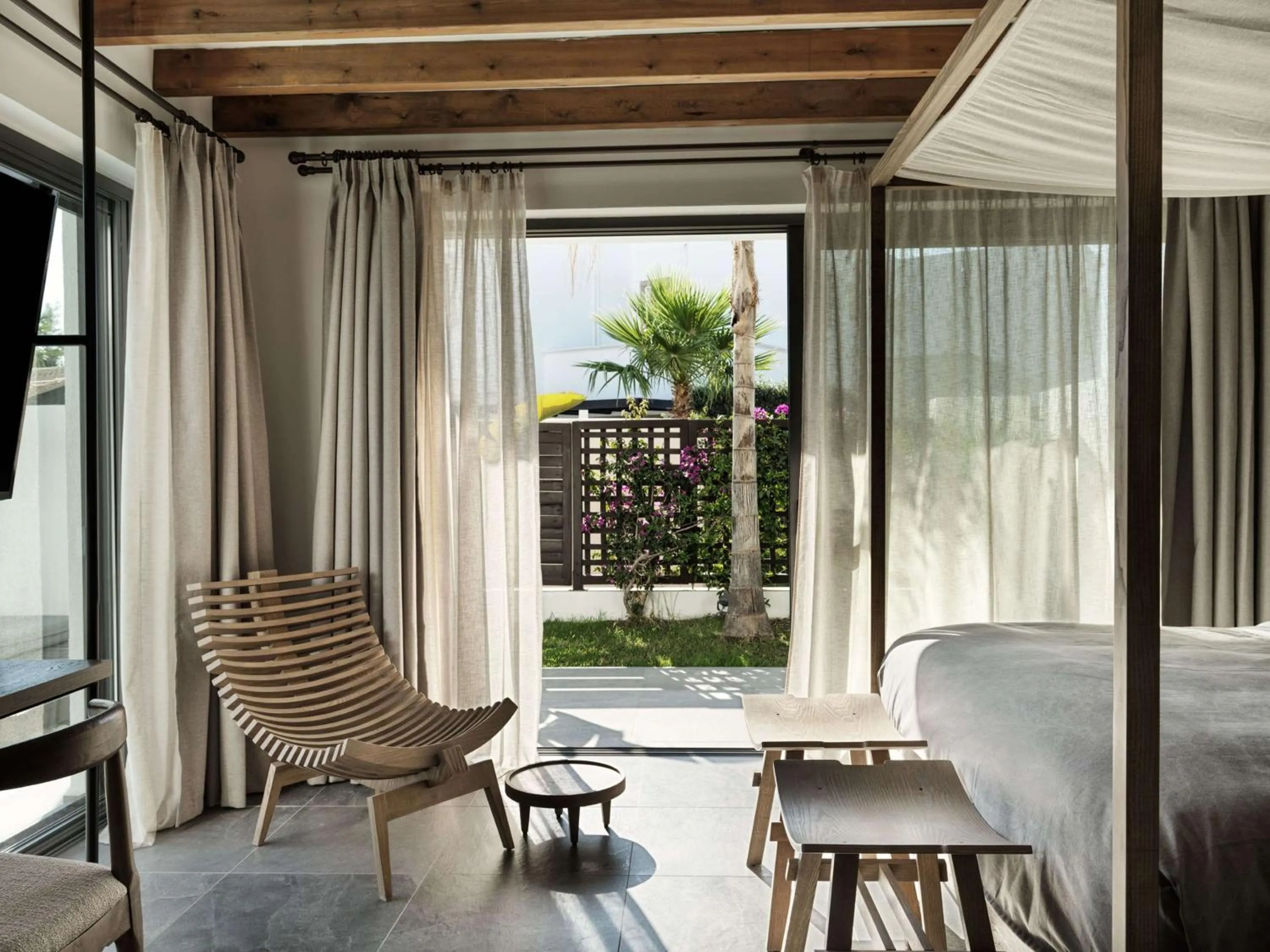 Bed in Lindian Village, Curio Collection by Hilton