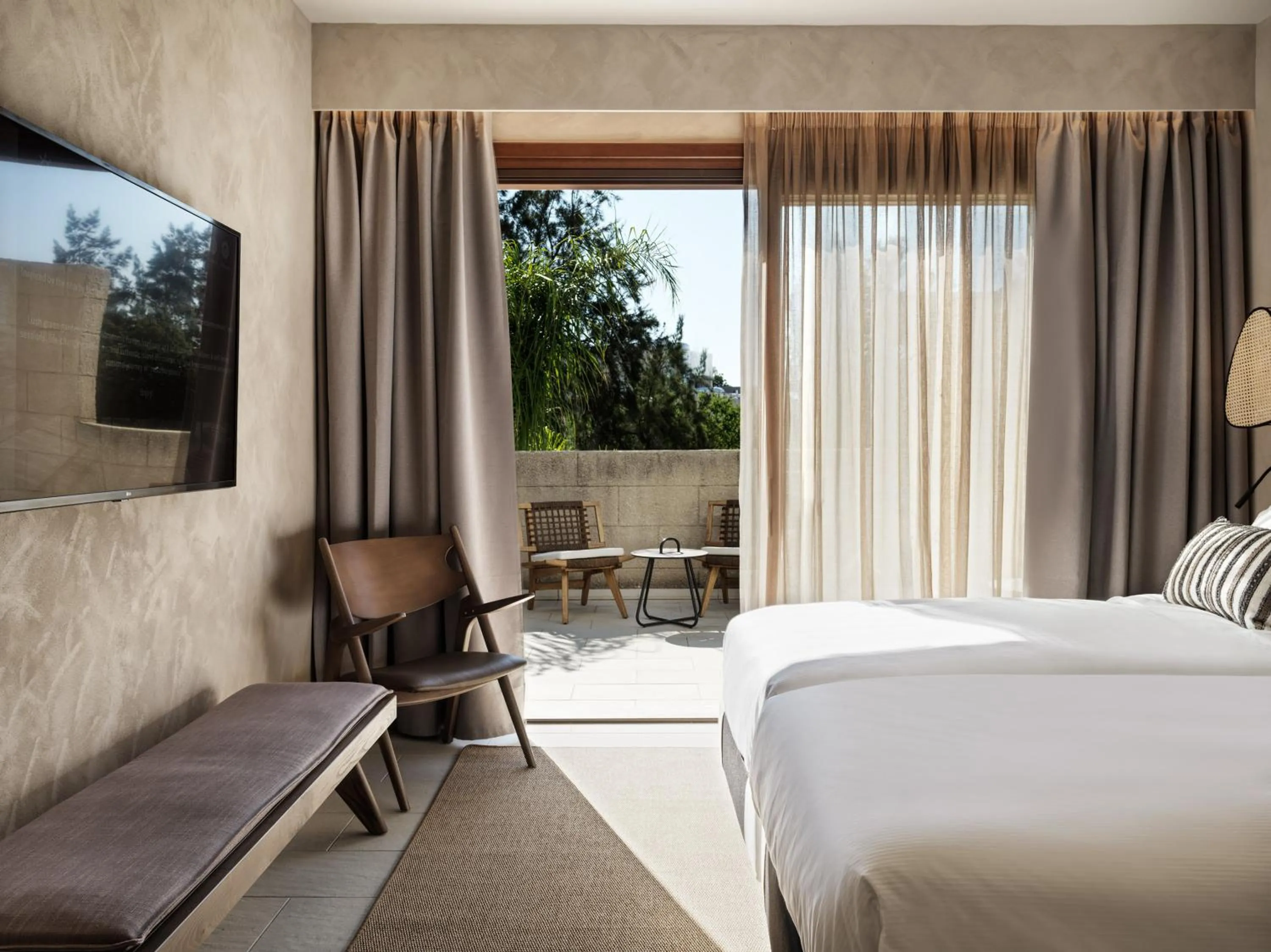 Bed in Lindian Village, Curio Collection by Hilton