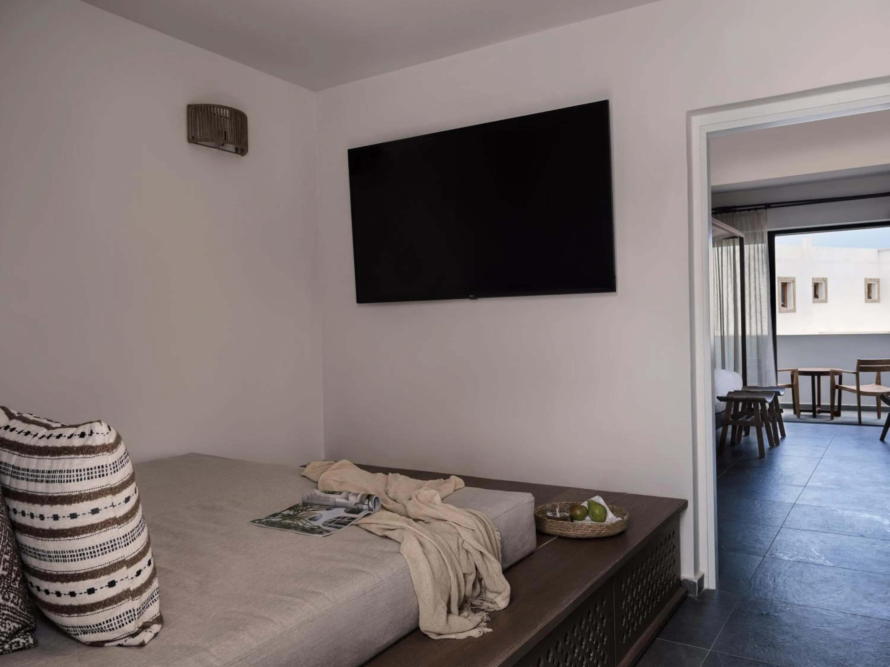 Bed in Lindian Village, Curio Collection by Hilton