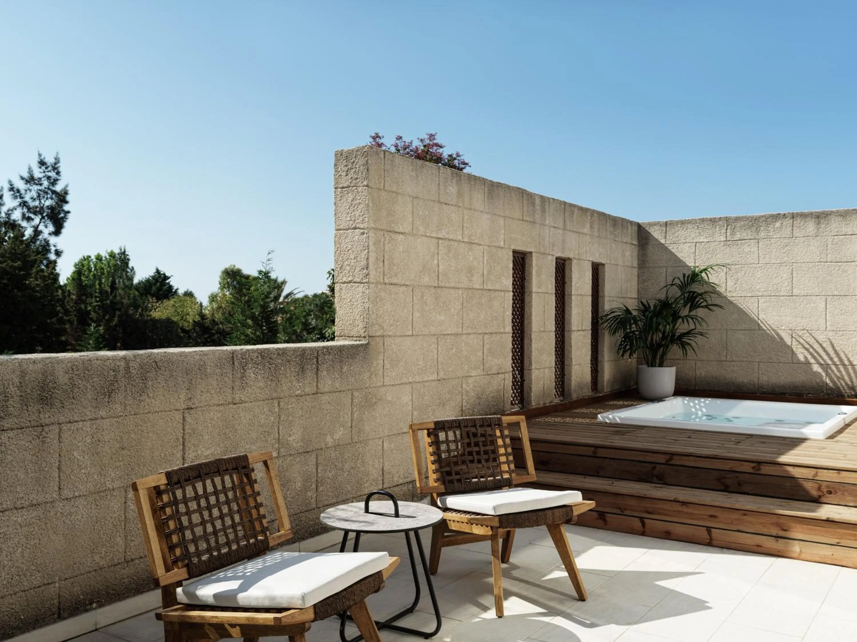 Patio in Lindian Village, Curio Collection by Hilton