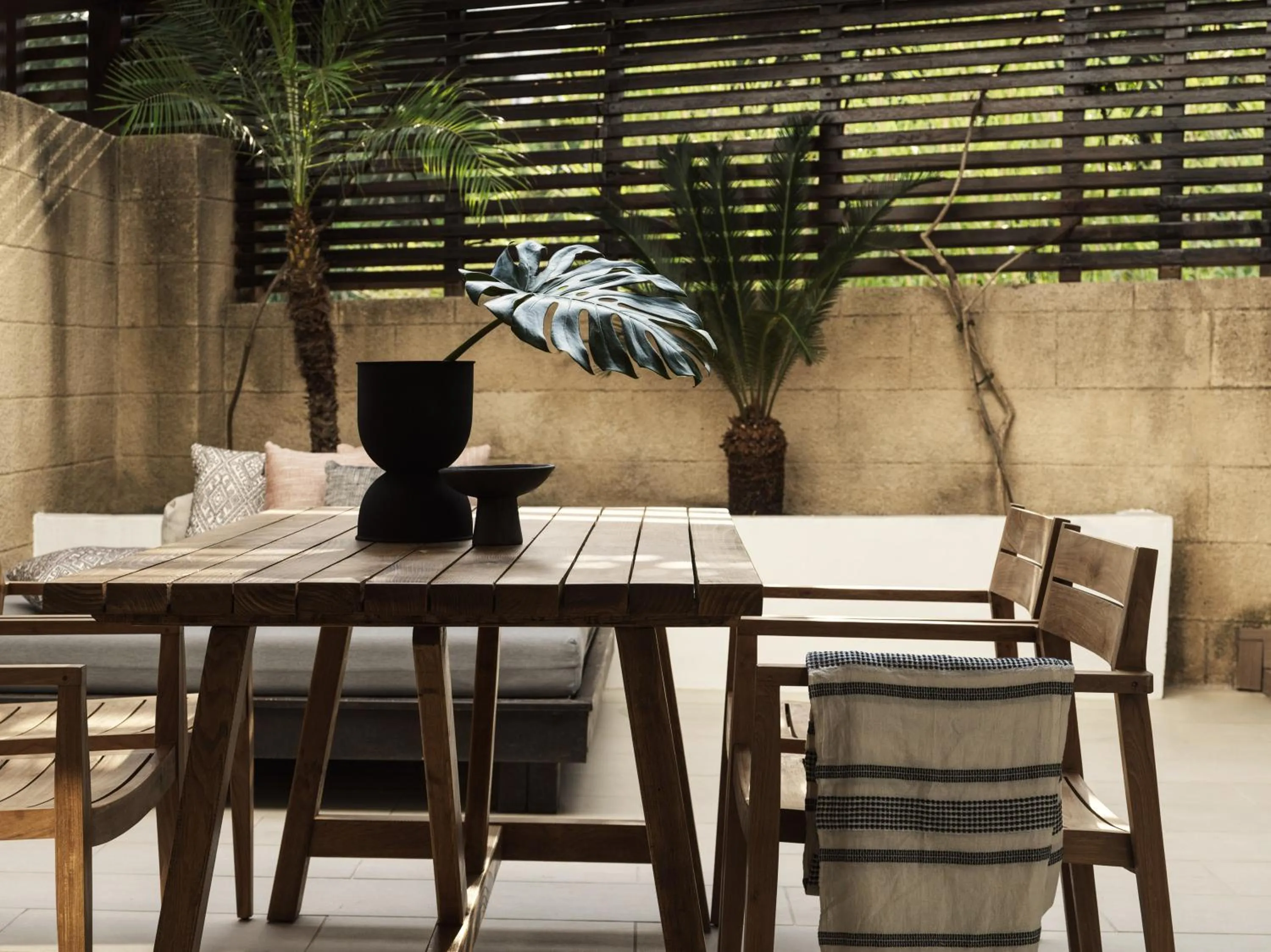 Patio in Lindian Village, Curio Collection by Hilton