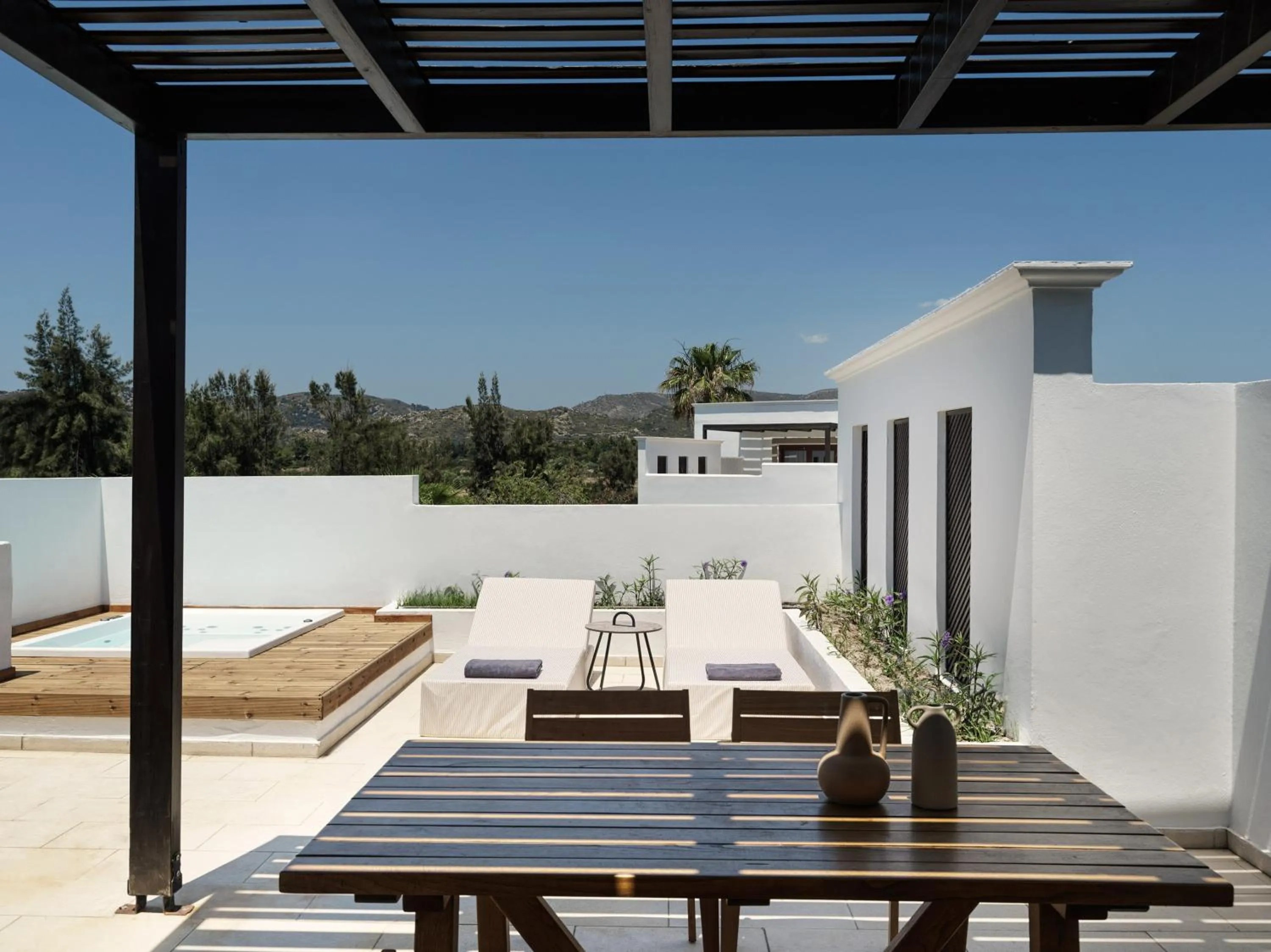 Patio in Lindian Village, Curio Collection by Hilton